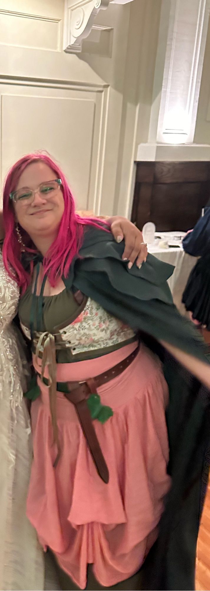 Dressed up as a hobbit on the right, with a stolen cape from my husband. Cropped to avoid showing the bride as I don’t have permission to share, but you can see her hand