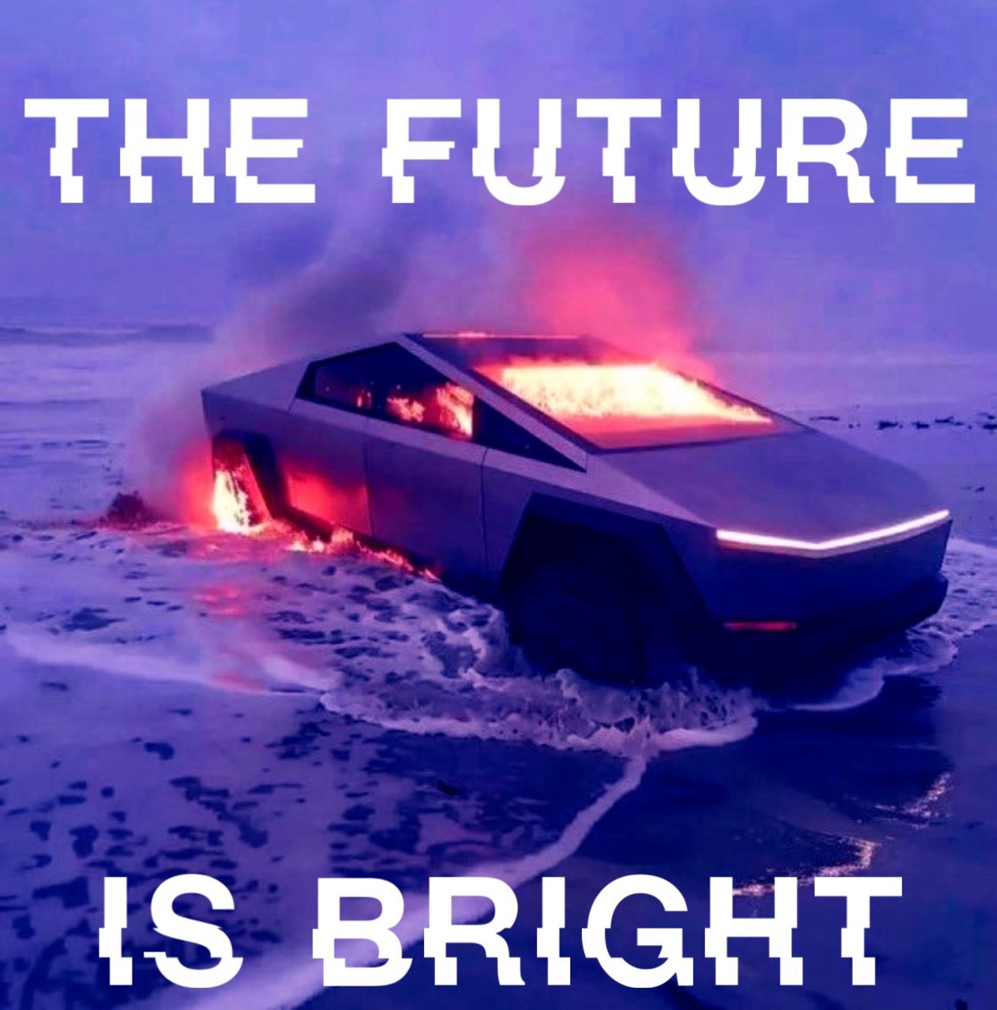 A Tesla cyber truck burning on a beach as the tide rolls in