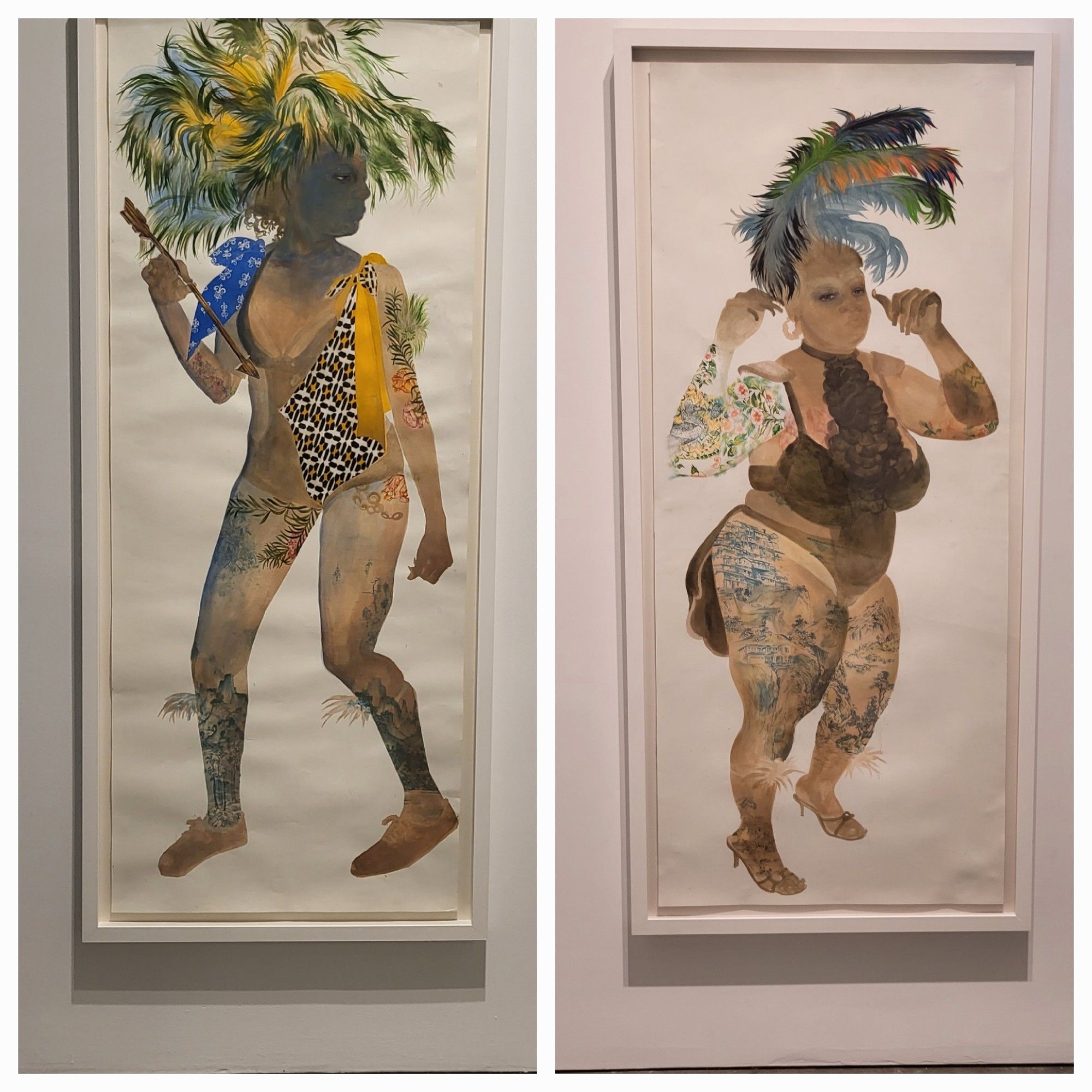 Two paintings of dancing Black women carnival revelers wearing costumes and feather headdresses, each is adorned with artful illustrations on their arms and legs, one wears sneakers, the other strappy high heels.