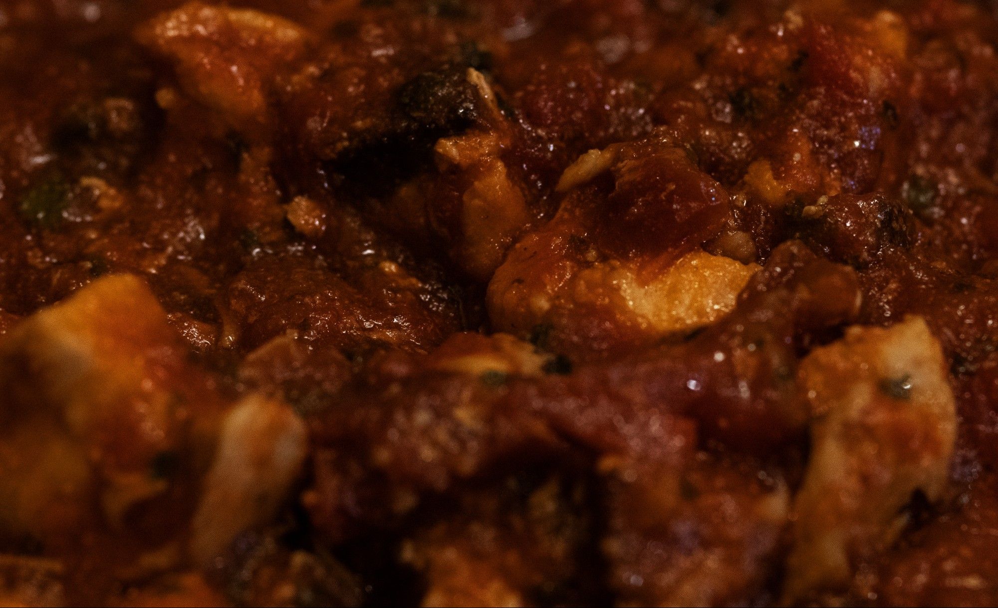 Chunks of chicken and chorizo in a thick herby tomato sauce