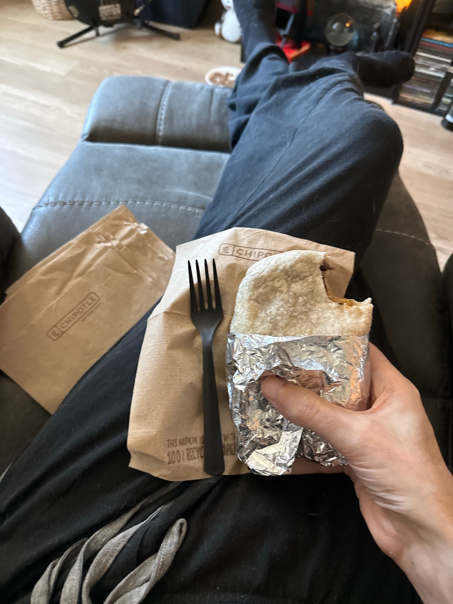 A freshly opened burrito from Chipotle, only one bite taken from a corner, is pictured alongside a slightly undersized plastic picnic fork.

The burrito is SHORTER than the fork!