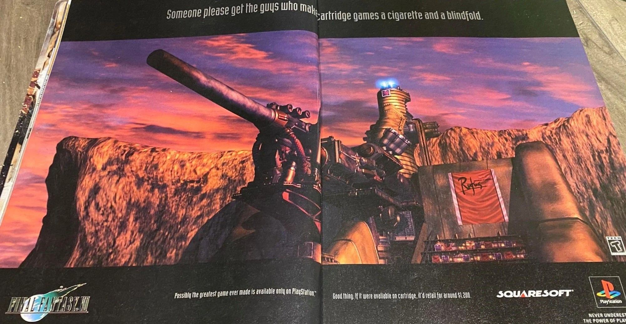 A large two-page print ad of the Sister Ray (a large, howitzer-style artillery cannon protruding from a cliffside military installation) from Final Fantasy 7. The top text reads "Someone please get the guys who make cartridge games a cigarette and a blindfold"

Below the image there are the FF7, squaresoft and Playstation logos, and some sub text that reads "Possibly the greatest game ever made is only available on Playstation™. Good thing. If it were available on cartridge, it'd retail for around $1,200"