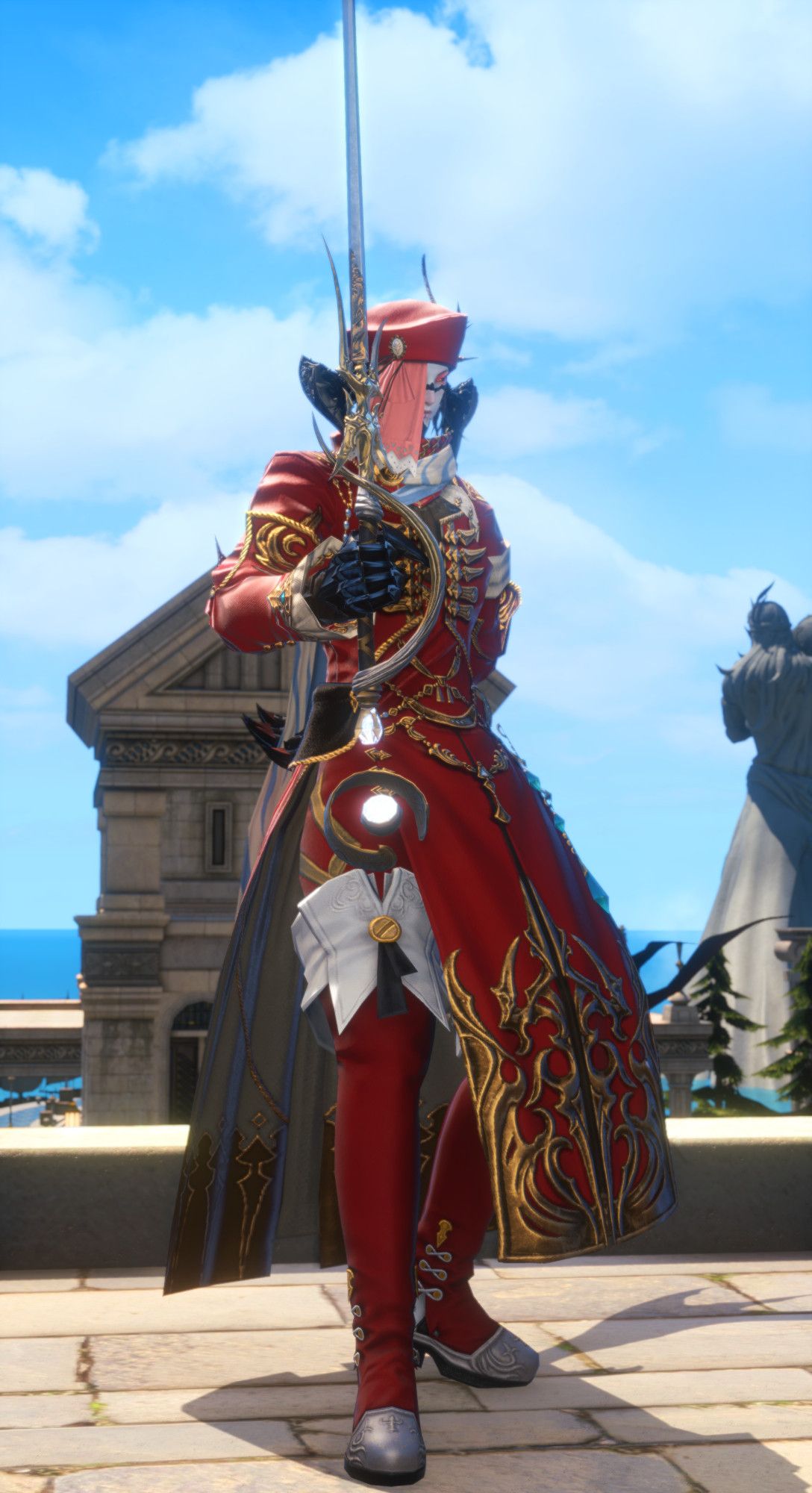 Male Au Ra striking a dueling pose with a Red Mage's rapier. He is wearing a long, ornate red-and-gold coat, red-and-gold tights and red-and-white thightboots. He is also wearing a red chapeau with a salmon red cloth covering half of his face.