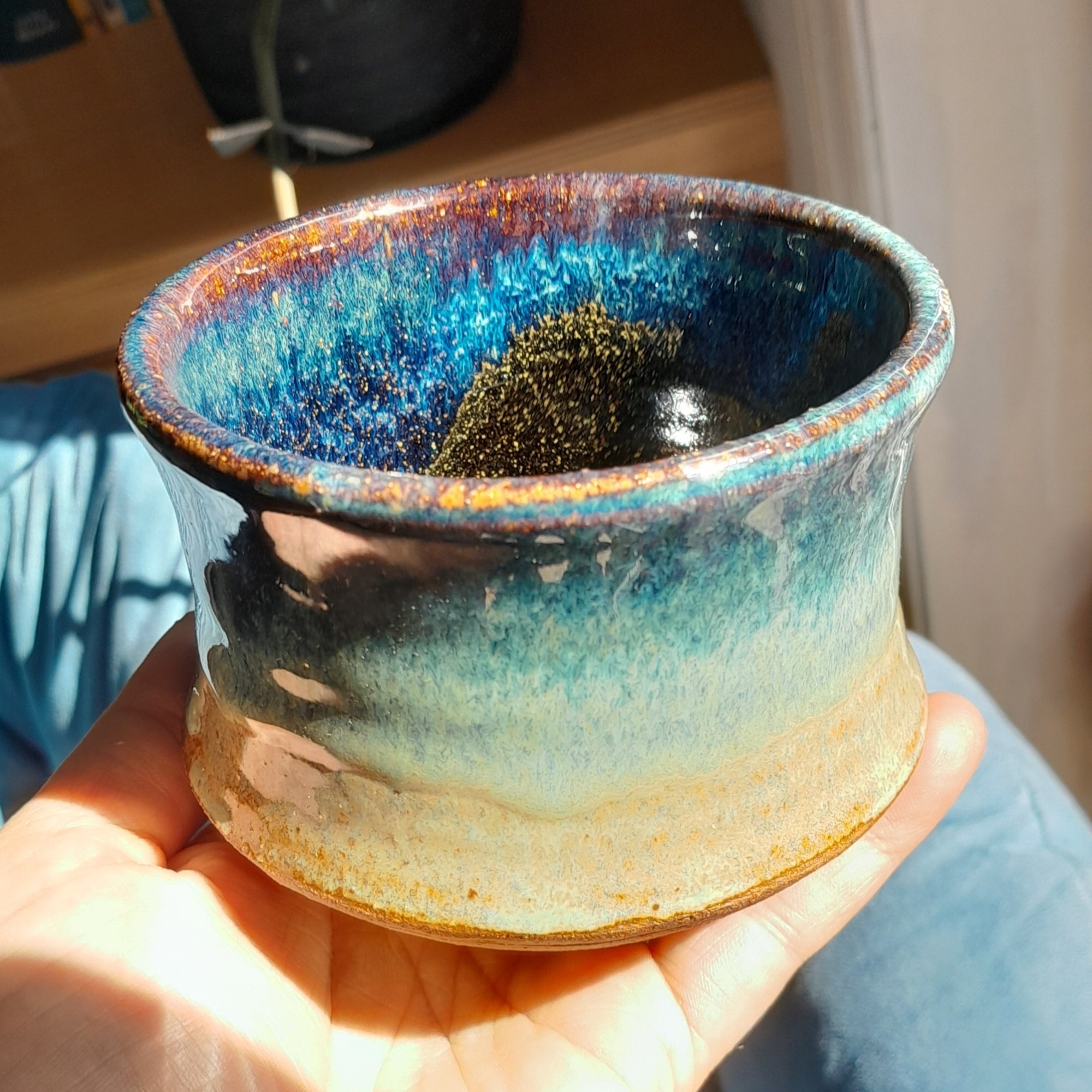 Teabowl with a copper and teadust glaze