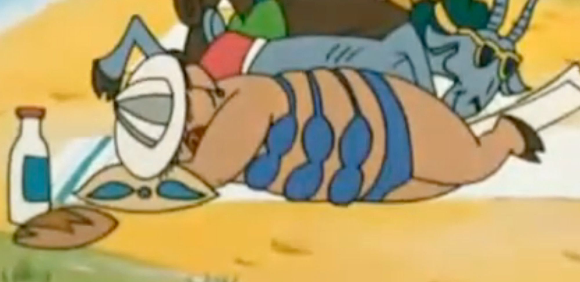 Pig in bikini form "Well, Just You Wait!" episode 1, that aired in 1969. The pig is laying on a beach blanket, suntanning. The bikini is 4 piece, with 3 pieces of it covering the pigs three pairs of titties.