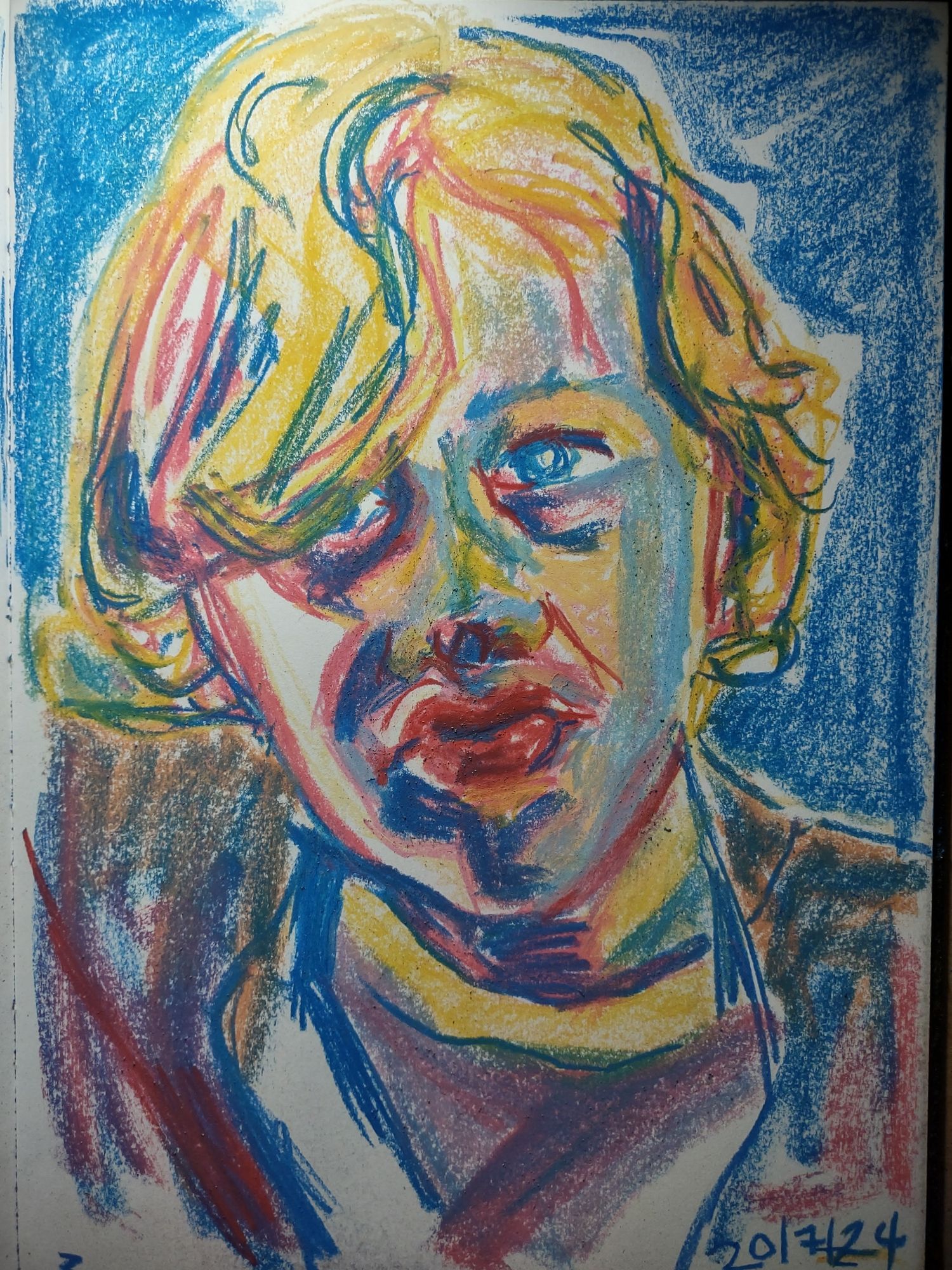 A soft pastel portrait of a boy. Colours are mostly red yellow and blue, not naturalistic.