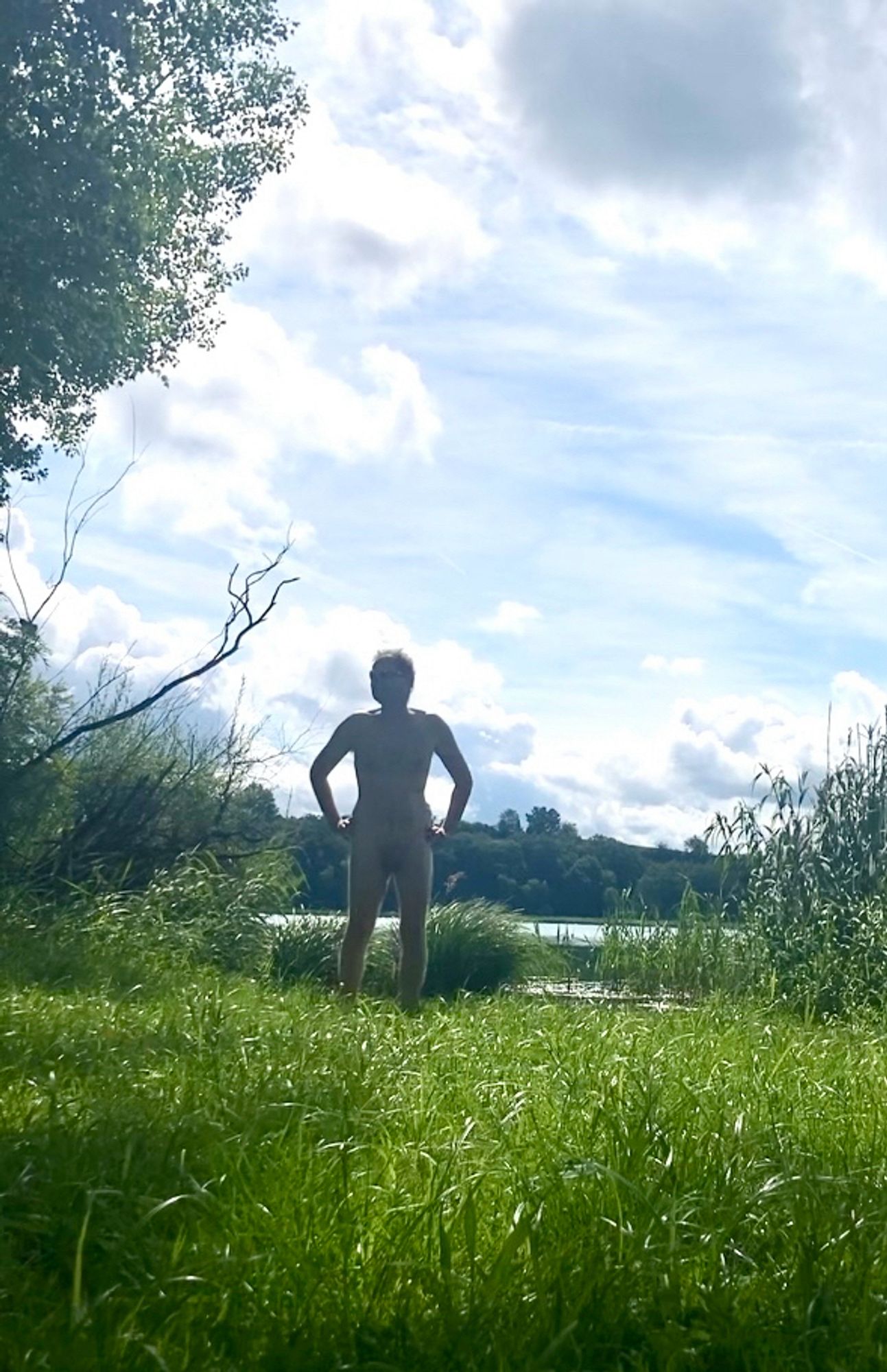 Nude man (frontal) at a lake.