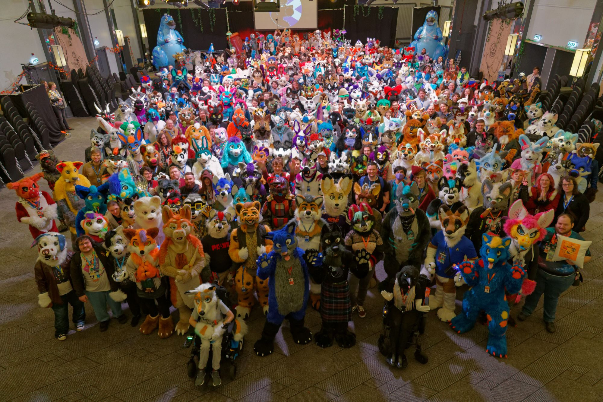 A collection of hundreds of fursuiters and a few other attendees from the Scotiacon 2024 Group Photo.