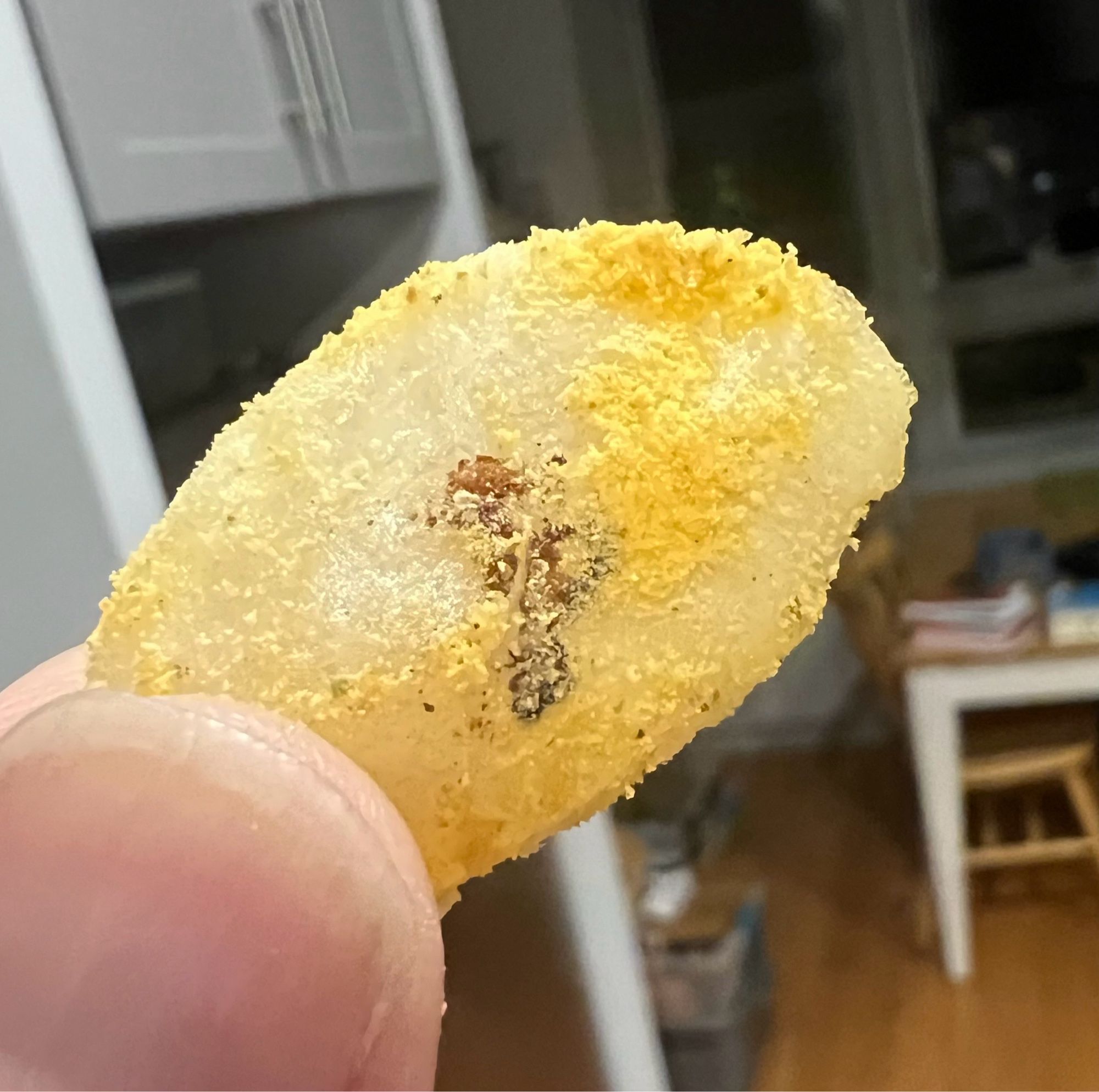 close-up of air-fried tteok with cheesy seasoning