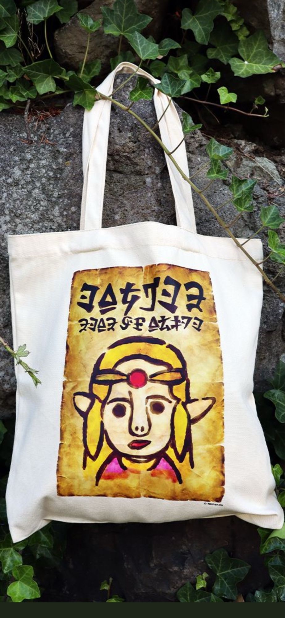 A MyNintendo Zelda tote bag where she looks kinda awkward