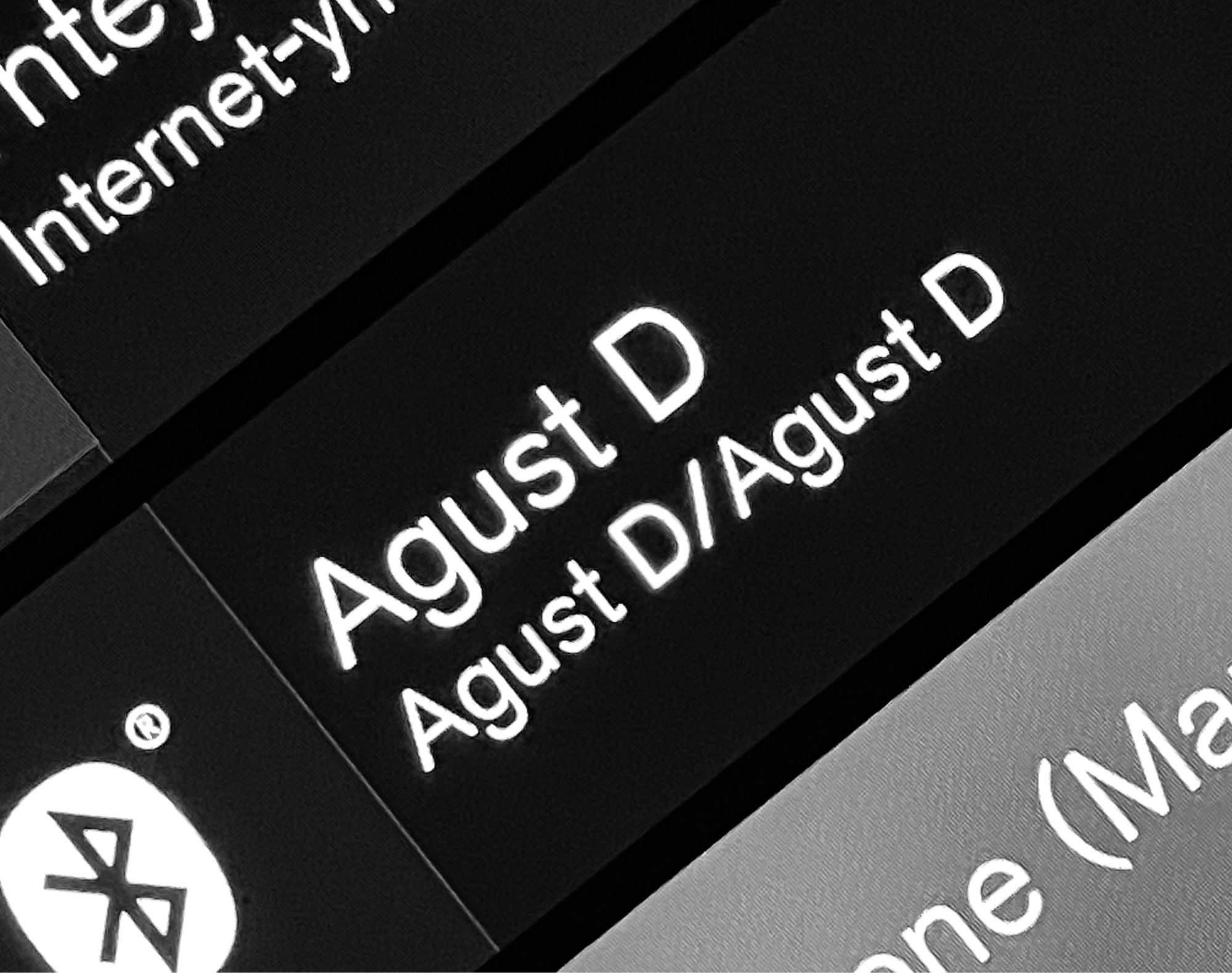 bw pic of my car’s console. It shows I’m listening to Agust D by Agust D from the album Agust D 🙂‍↕️