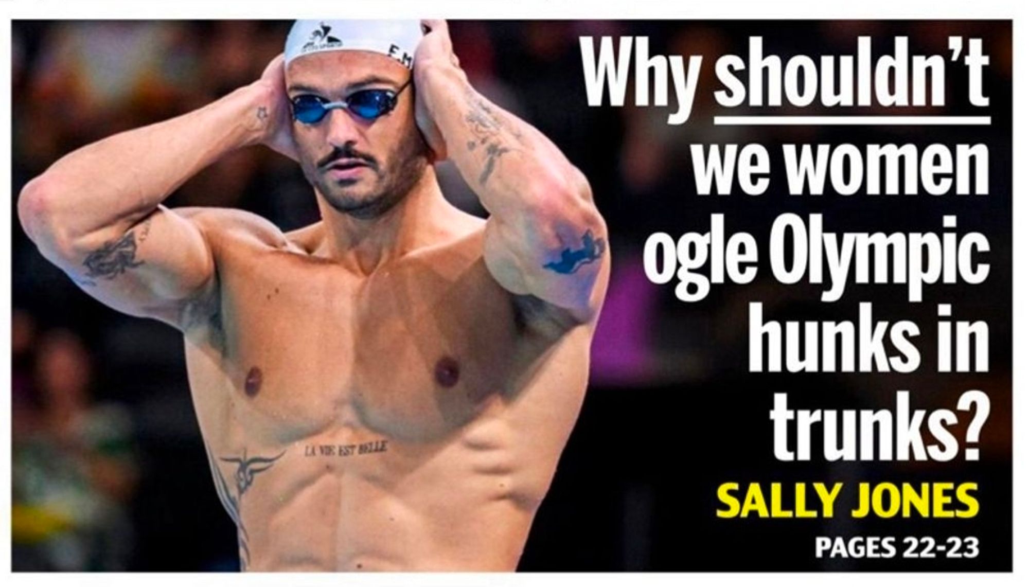 Photo of a teaser from the Mail’s front page: an incredibly hot swimmer with the caption:

Why SHOULDN’T we women phone Olympic hunks in trunks?
Sally Jones
Pages 22–23