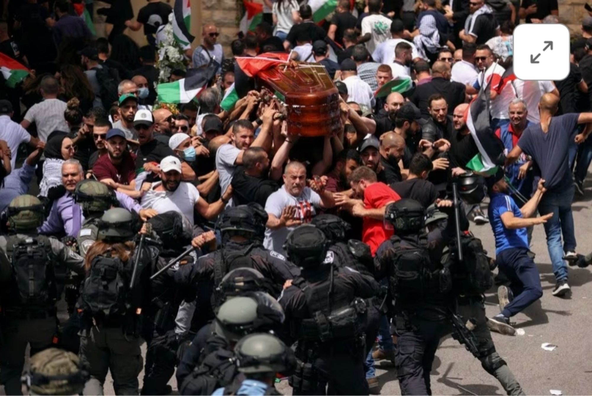 Family and friends carry the coffin of Al Jazeera reporter Shireen Abu Akleh, who was killed during an Israeli raid in Jenin in the occupied West Bank