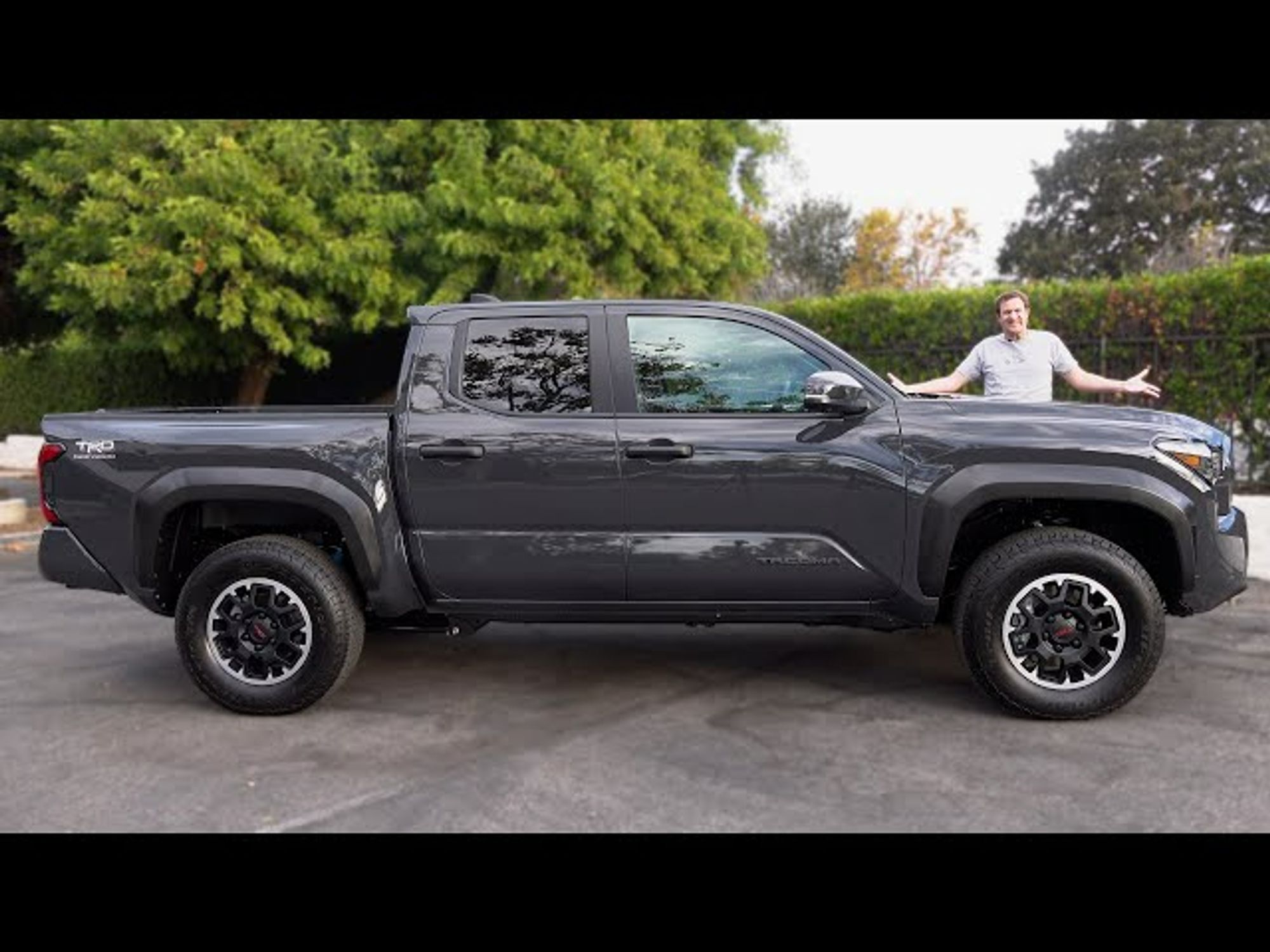 The very latest Tacoma with Doug behind it, and the hood is as long and high as ever... if anything, it appears to be slightly higher relative to Doug's torso, but that may just be where he is standing. The important part is the lack of downward slop to a low initial contact point, which is critical to ensuring a struck pedestrian is elevated onto the hood instead of being pulled under the wheels