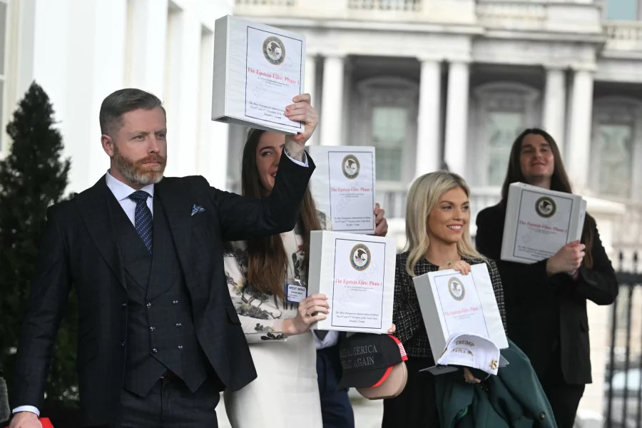 Several conservative commentators carry binders bearing the seal of the Justice Department and reading "The Epstein Files: Phase 1" as they walk out of the West Wing of the White House on Feb. 27.

Bondi drew fire for an interview this year in which she said Epstein's client list was "sitting on my desk right now to review," the same month she handed right-wing influencers binders marked "The Epstein Files: Phase 1" that mostly contained largely redacted documents that had already been made public.

"The fact that the U.S. government, the one that I voted for, refused to take my question seriously and instead said, 'Case closed. Shut up, conspiracy theorist,' was too much for me," he said. "And I don't think the rest of us should be satisfied with that."

https://www.npr.org/2025/07/14/nx-s1-5467151/trump-epstein-files-doj-fbi-maga



