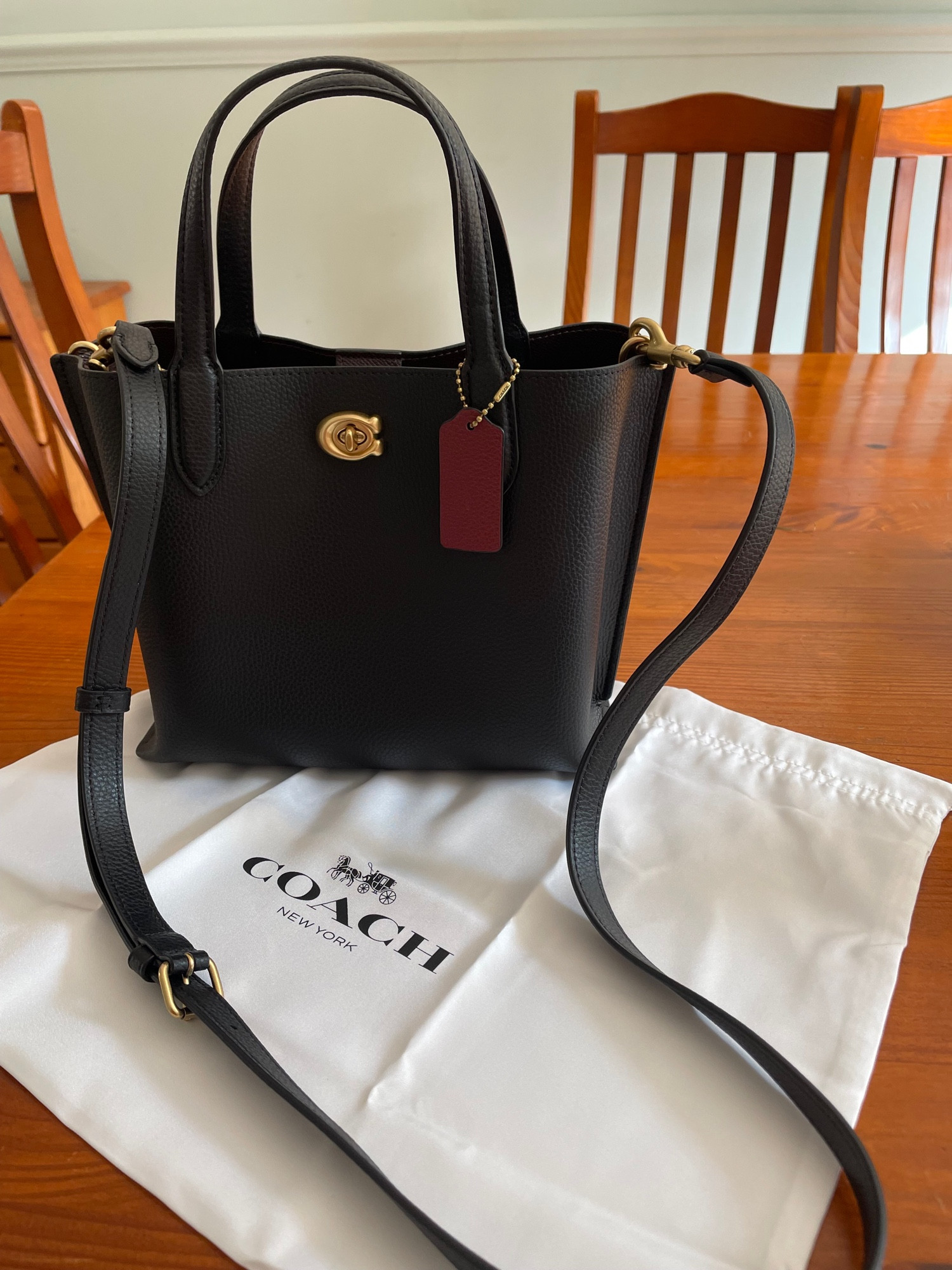 Couch black handbag