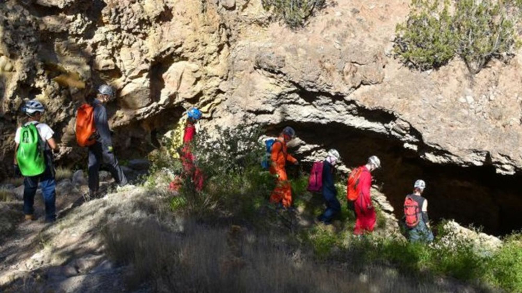 Capitan high school students enter New Mexico's Fort Stanton Cave.