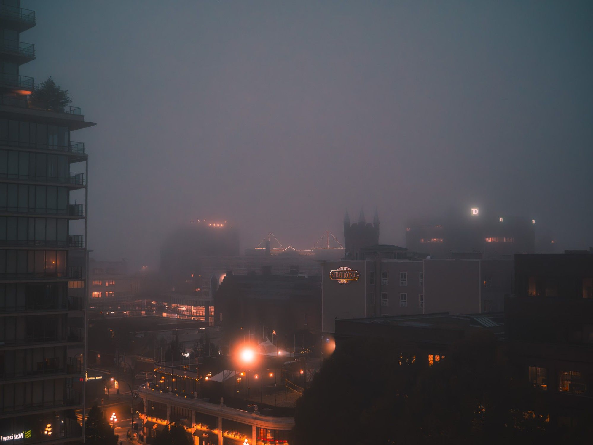 Looking Northwest over downtown Victoria's Douglas street and beyond with a thick fog.