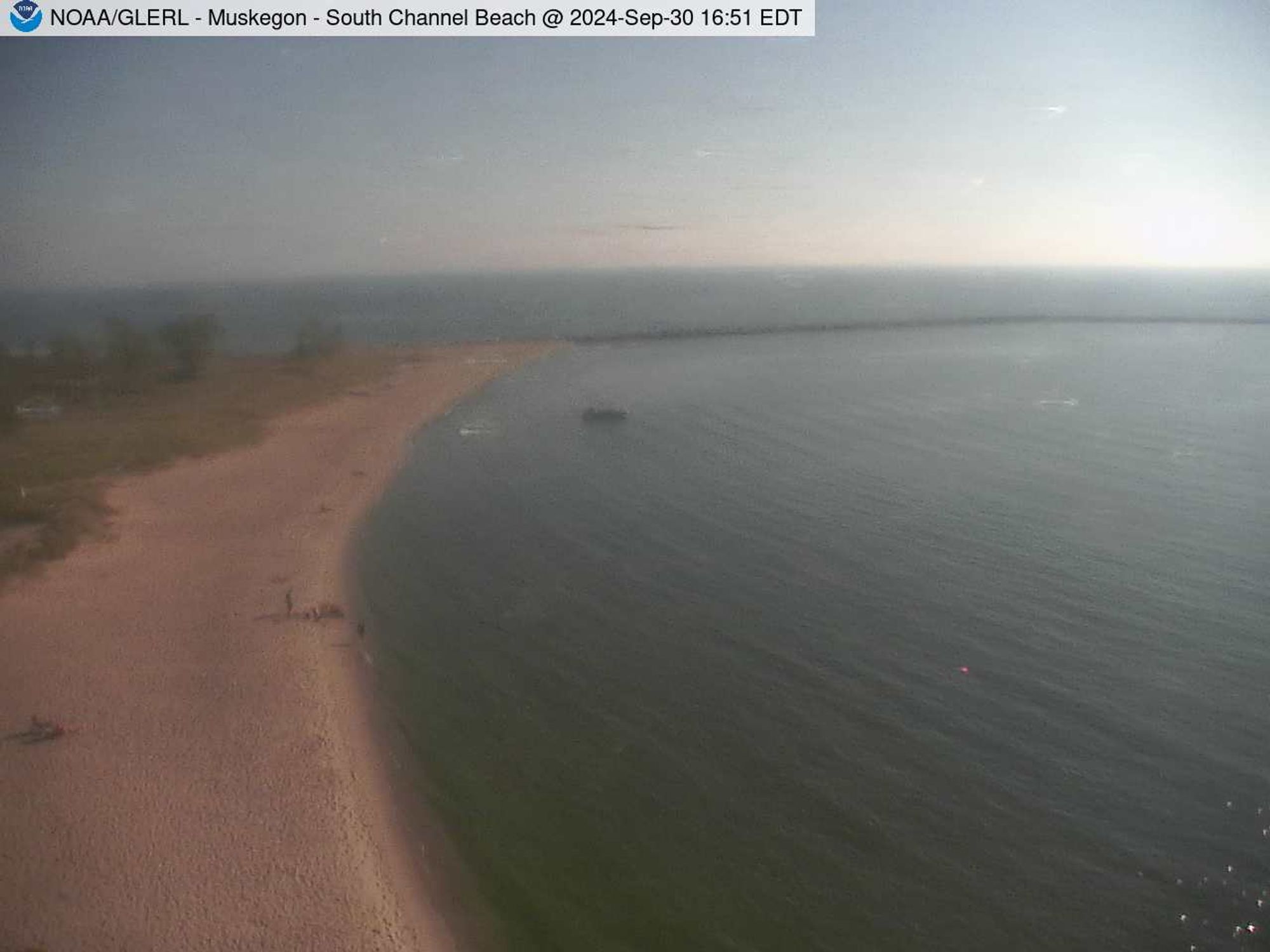 View above South Channel Beach in Muskegon as it meets Lake Michigan. // Image captured at: 2024-09-30 20:51:01 UTC (about 12 min. prior to this post) // Current Temp in Muskegon: 73.20 F | 22.89 C // Precip: few clouds // Wind: WSW at 8.053 mph | 12.9 kph // Humidity: 76%