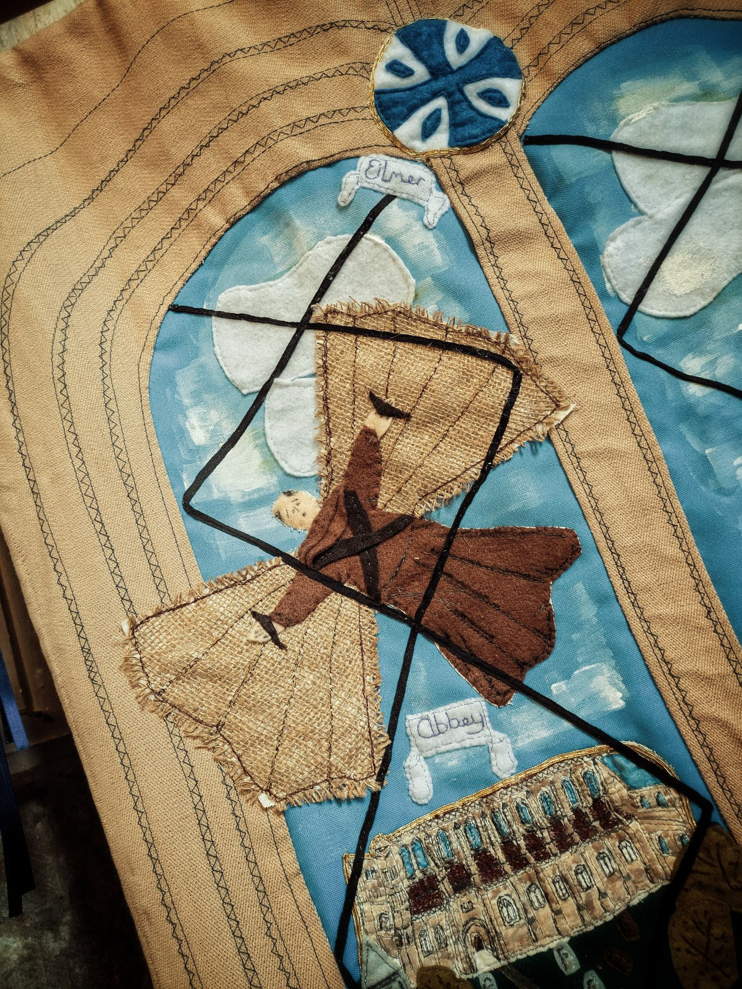 Eilmer of Malmesbury in flight on a piece of tapestry 