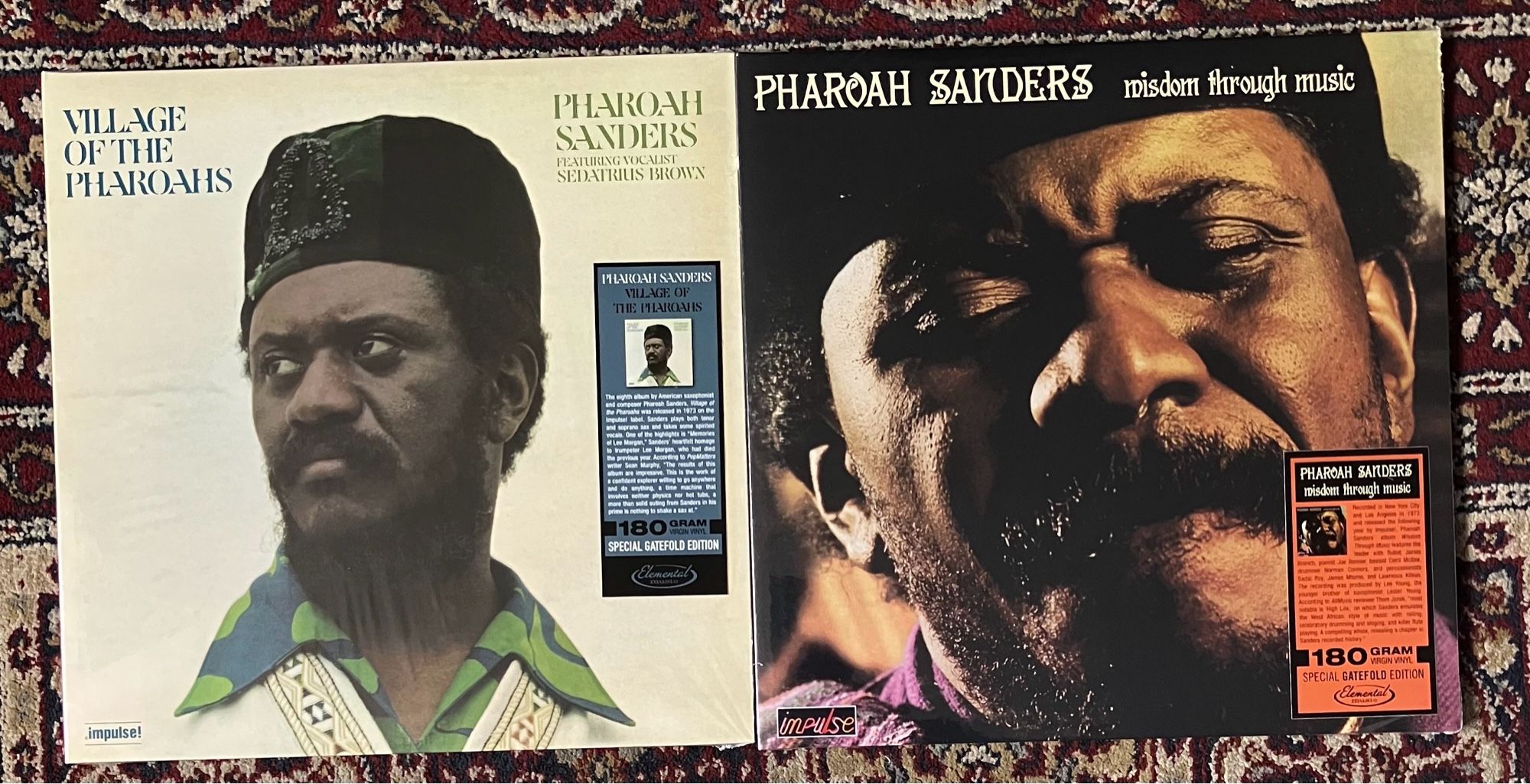 Photograph of Pharoah Sanders - Village Of The Pharoahs LP on the left and 
Pharoah Sanders - wisdom through music LP on the right. 
Both covers have headshots of Pharoah on the front.