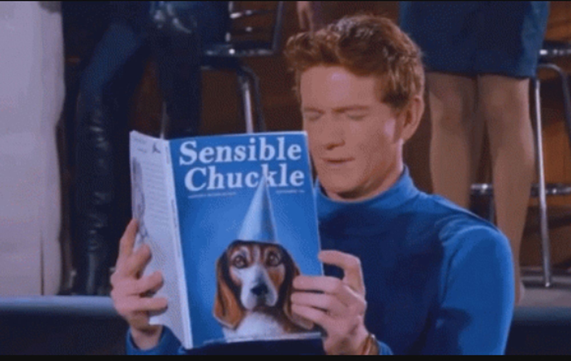 sensible chuckle meme: a red-headed man reading a magazine called "sensible chuckle" gives a sensible chuckle