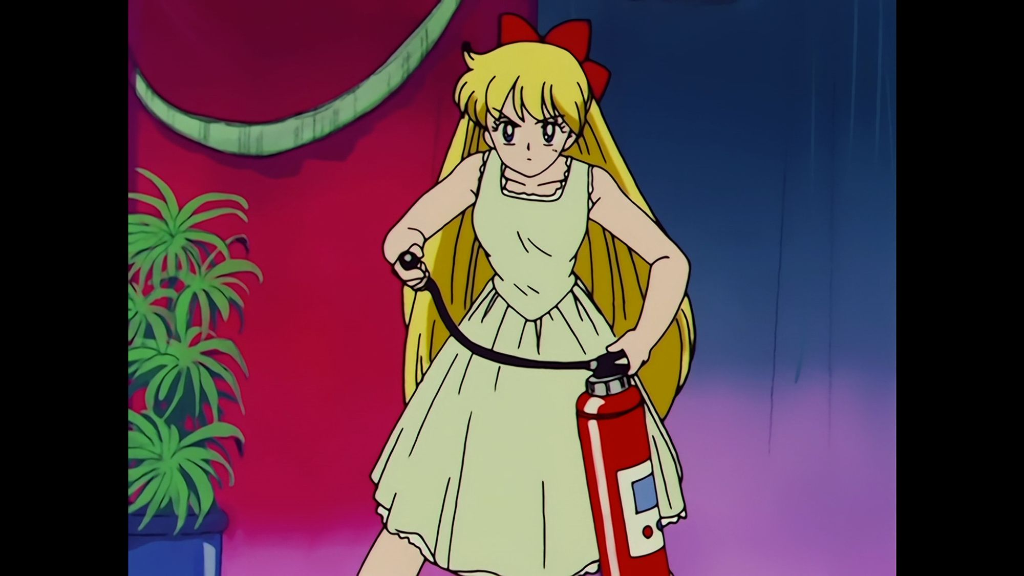 Minako from Sailor Moon about to use a fire extinguisher