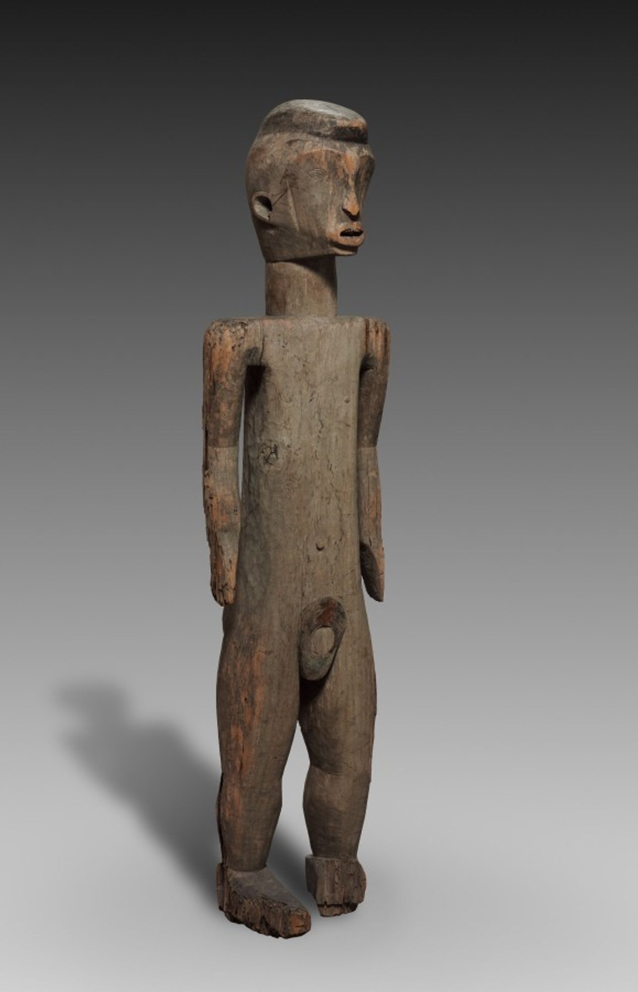 The Ubangi region's history of successive migrations and assimilations has resulted in numerous exchanges of religious beliefs and ritual practices. Because little research has been conducted in the region, data regarding the production, use, and meaning of Ubangi sculpture are scant. Despite some stylistic traits, including the heart-shaped faces and the male's crested coiffure, this figure pair is unlike any other in the Ubangian corpus. Based on indirect evidence, the pair has been attributed to the little-known Monzombo and is said to represent the culture's primordial couple. However, no other sculptures have been ascribed to the Monzombo, and we lack further details on their art.