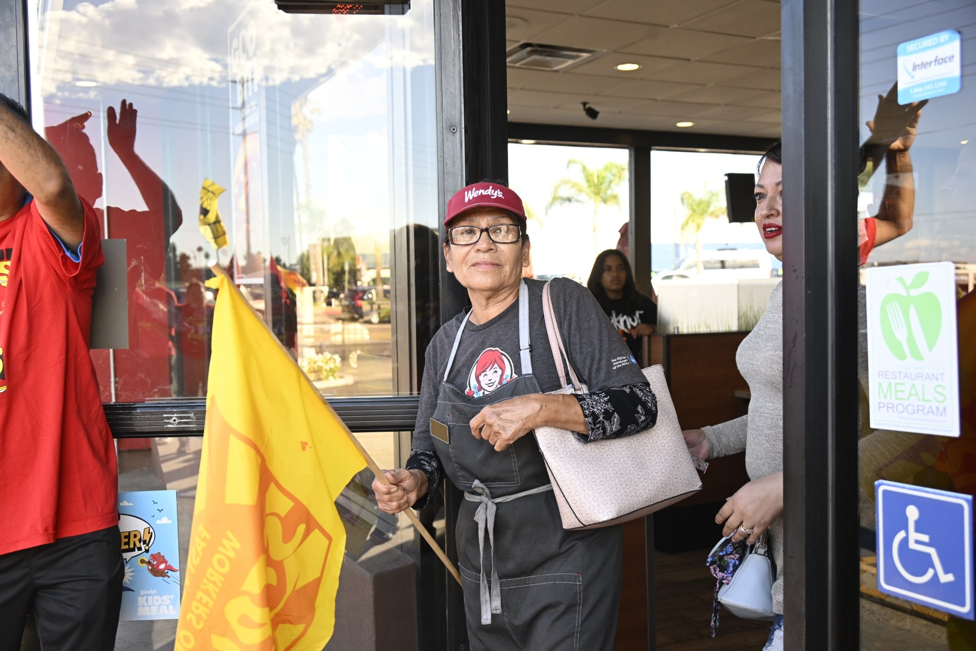 Wendy's worker Marcela Garcia leads her coworkers on strike