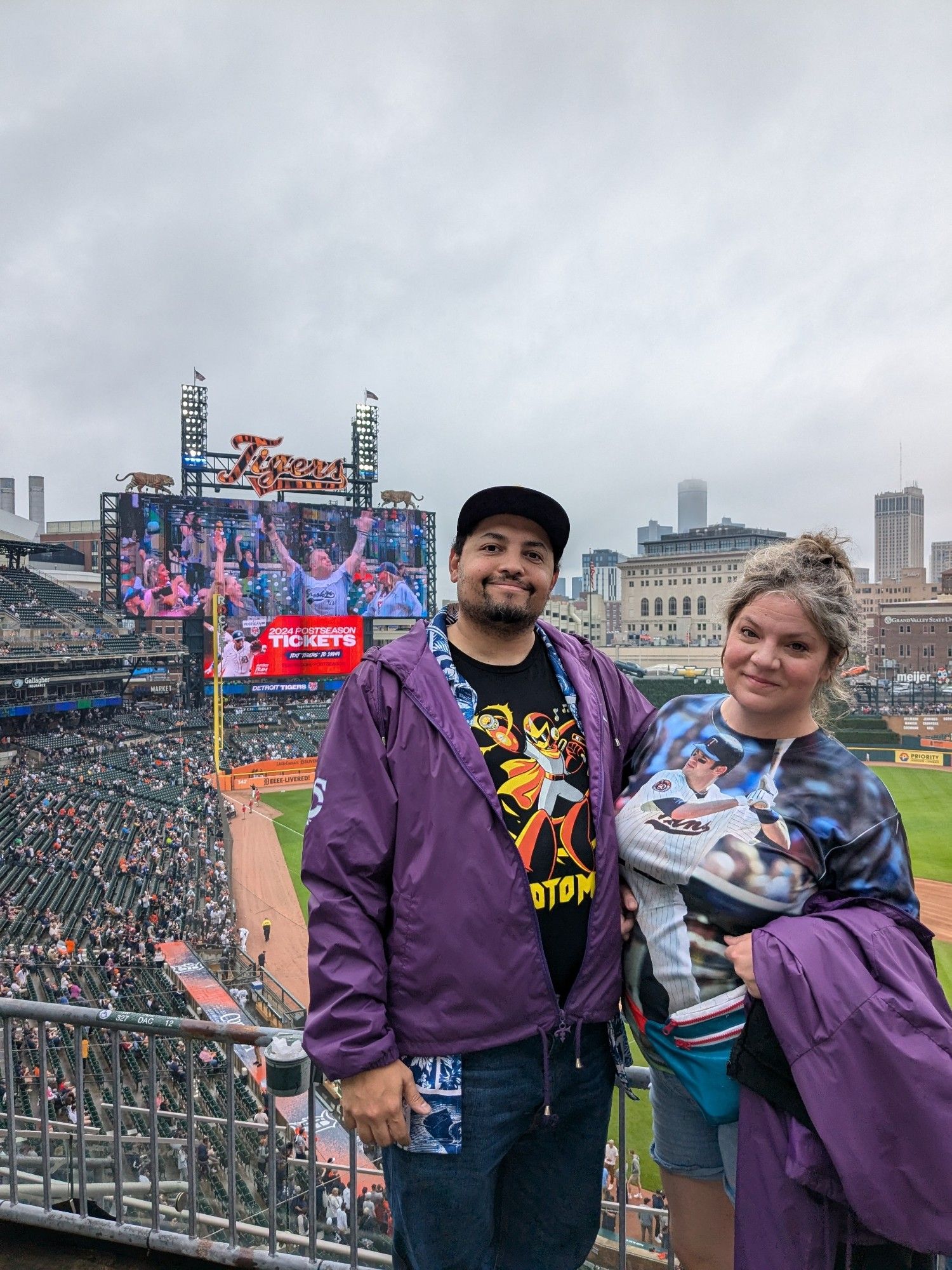 Greg and Maija in Comerica Park with the Tigers Scoreboard behind us