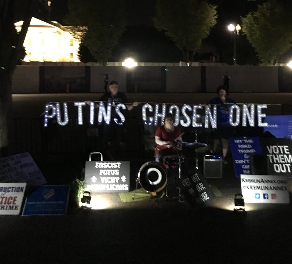 Activists hold sign PUTIN’S CHOSEN ONE at Trump 1.0 White House 