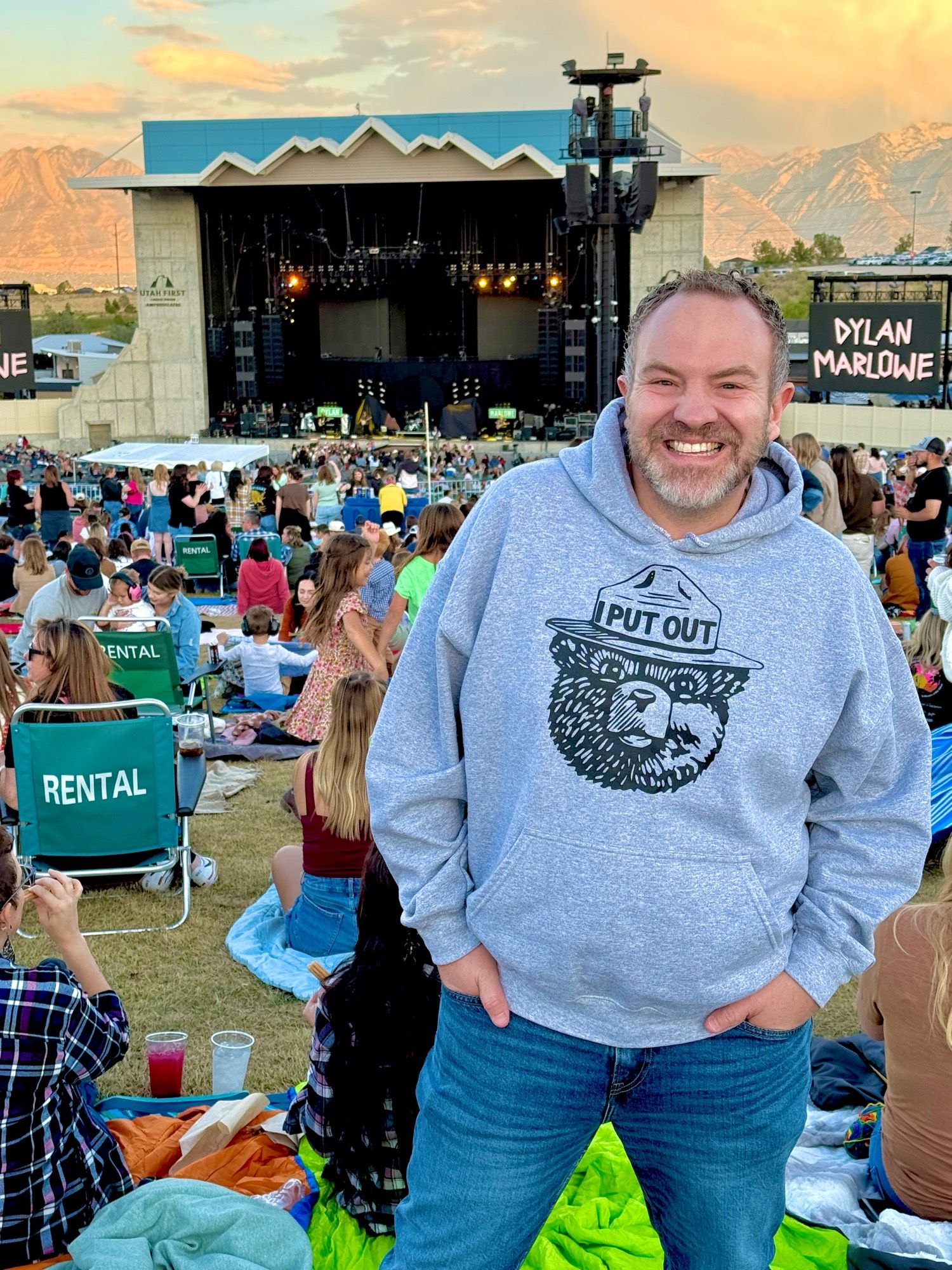 Me wearing my Smokey the bear hoodie that says I put out.