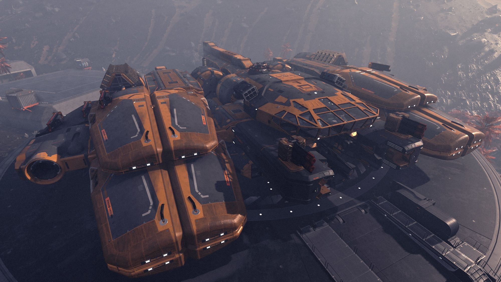 Screenshot from the game Starfield, centring on a large gold and black ship docked at a landing pad.