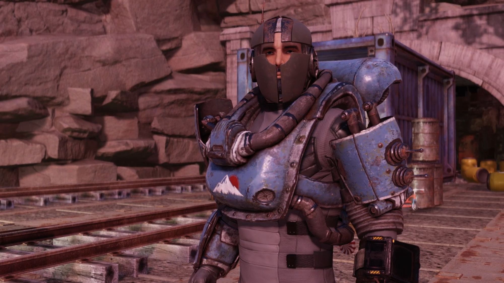 Screenshot from the game fallout 76 centring on the player character wearing a mismatched suit of armour made of metal and pipes.