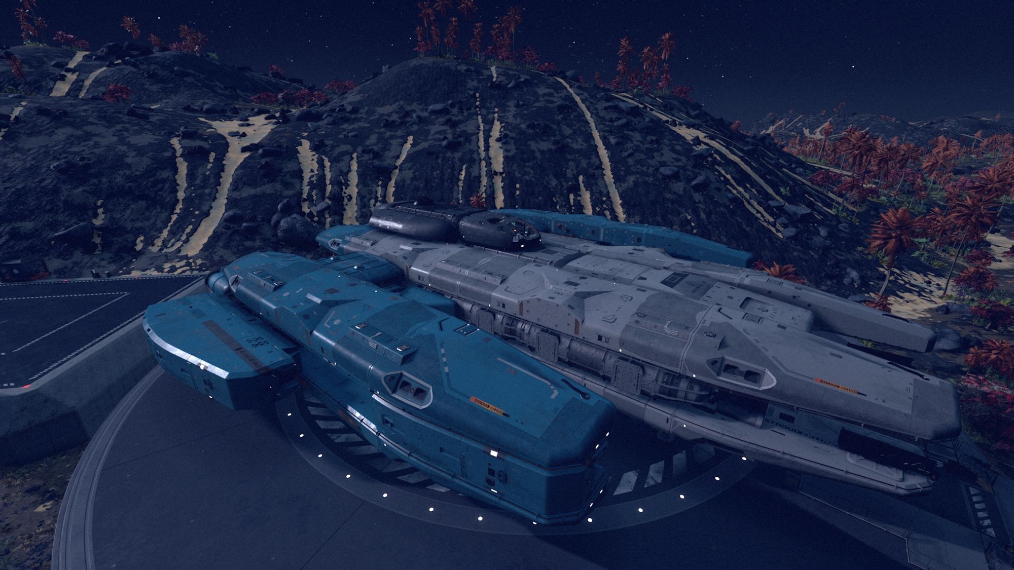 Screenshot from the game Starfield focusing a white, blue, and black ship at a landing pad.