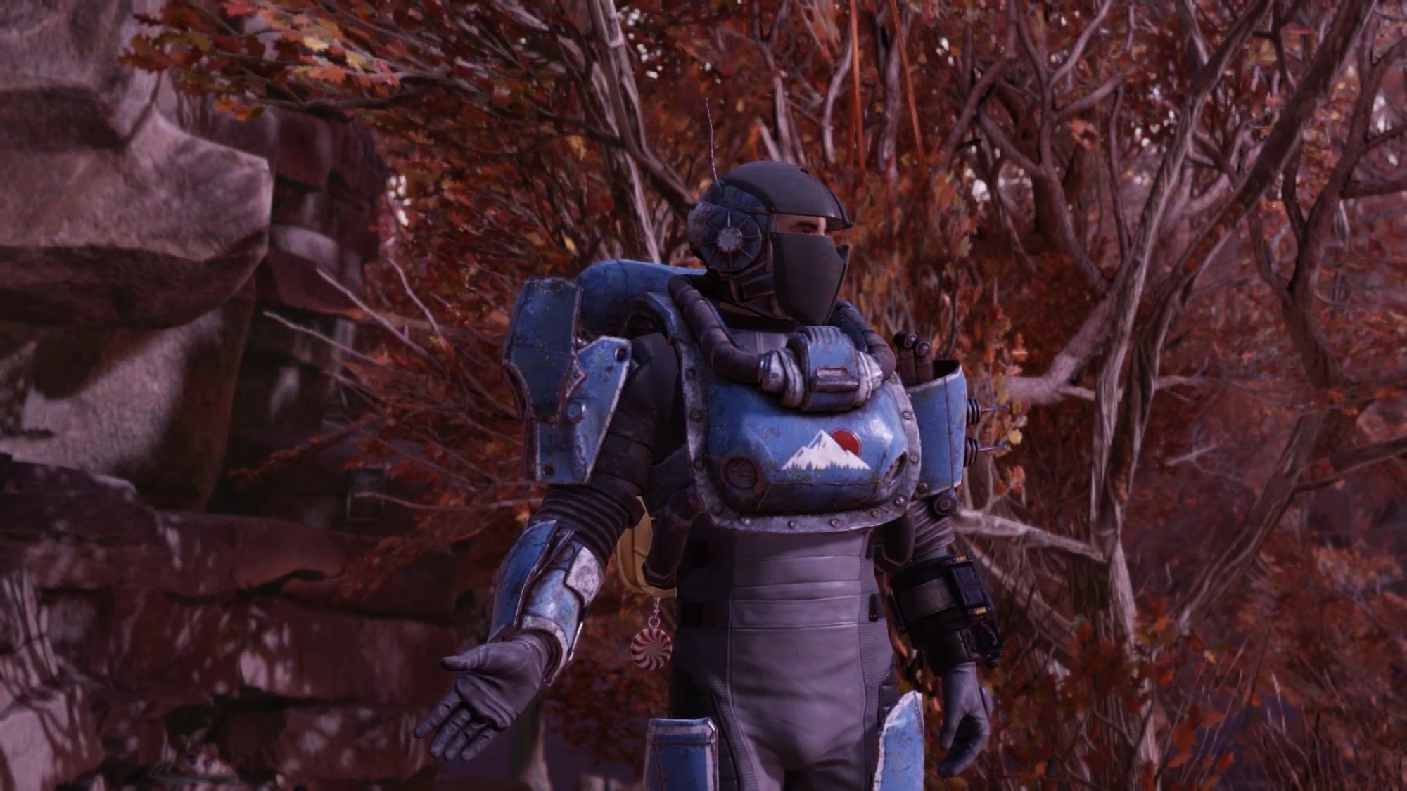 Screenshot from the game fallout 76 centring on the player character wearing a mismatched suit of armour made of metal and pipes.