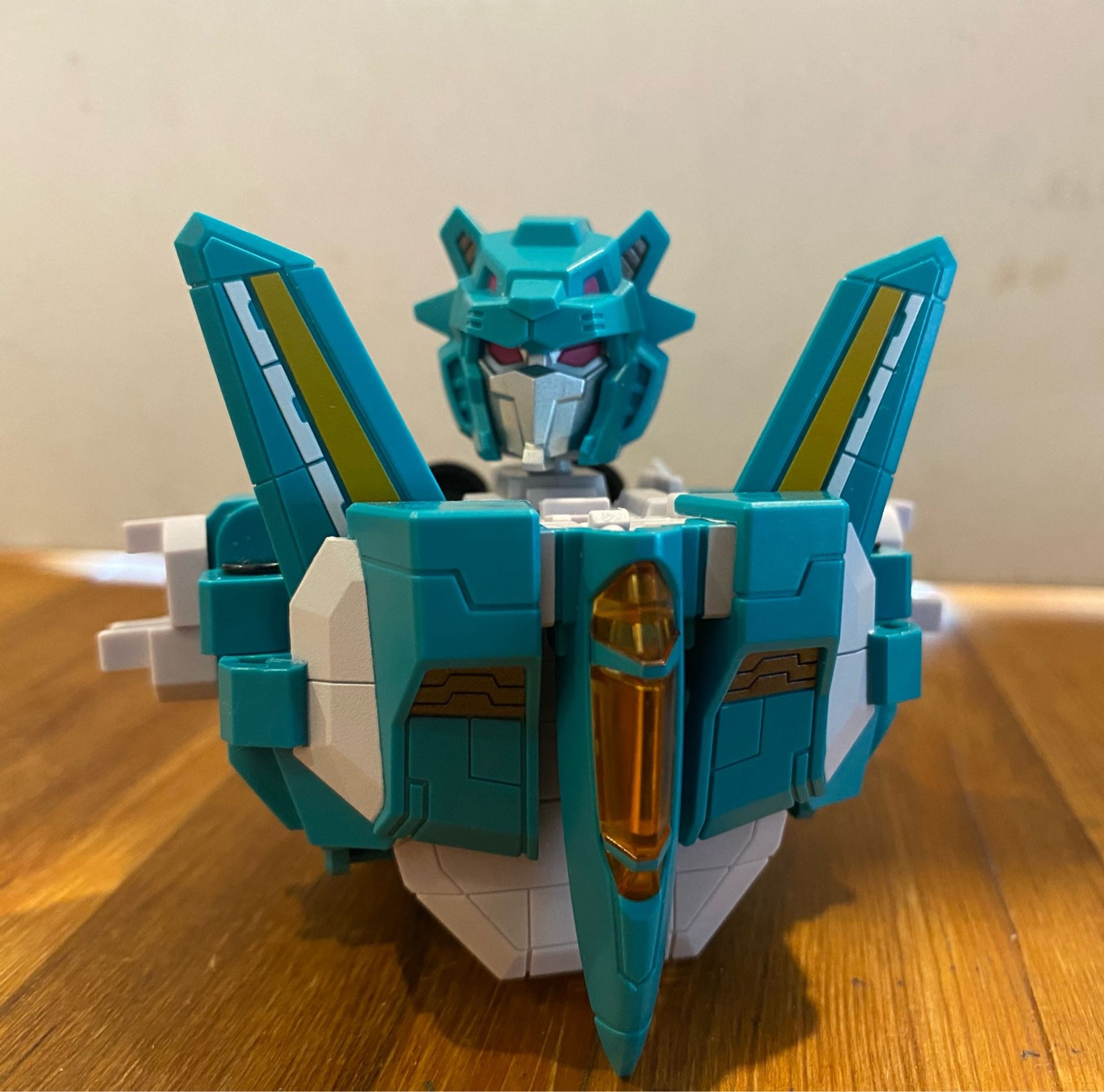 Image of the 3rd party action figure of the Transformers Breastforce character Leozack by Iron Factory. Leozack is in his Leozack combiner positioning with the top of the jet and wings facing the camera and a large head having emerged.