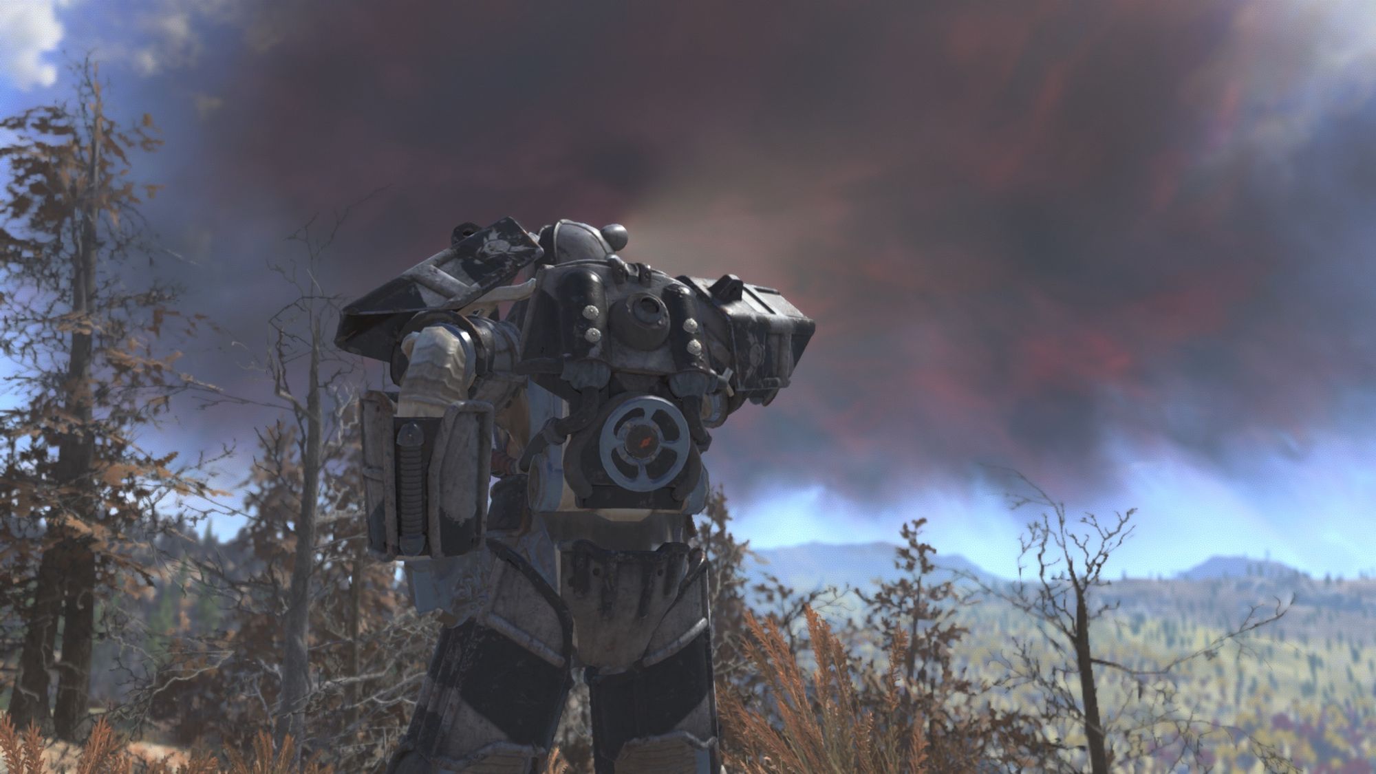 Screenshot from the game Fallout 76 centring on the player character wearing a suit of Union power armour in Devilish Paint. The player character is looking out over the recently discovered Shenandoah Valley.