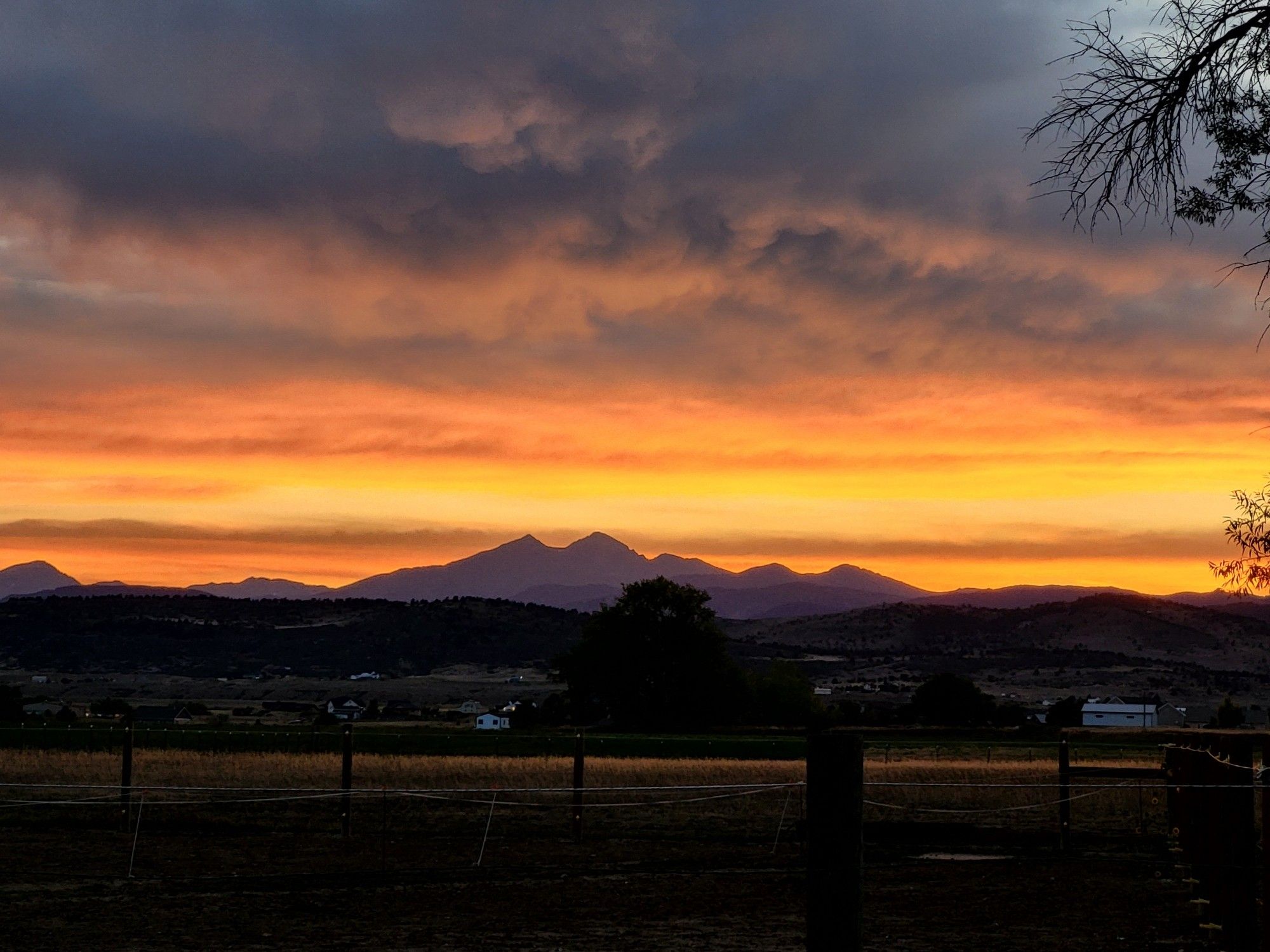 A sunset above a mountain range.