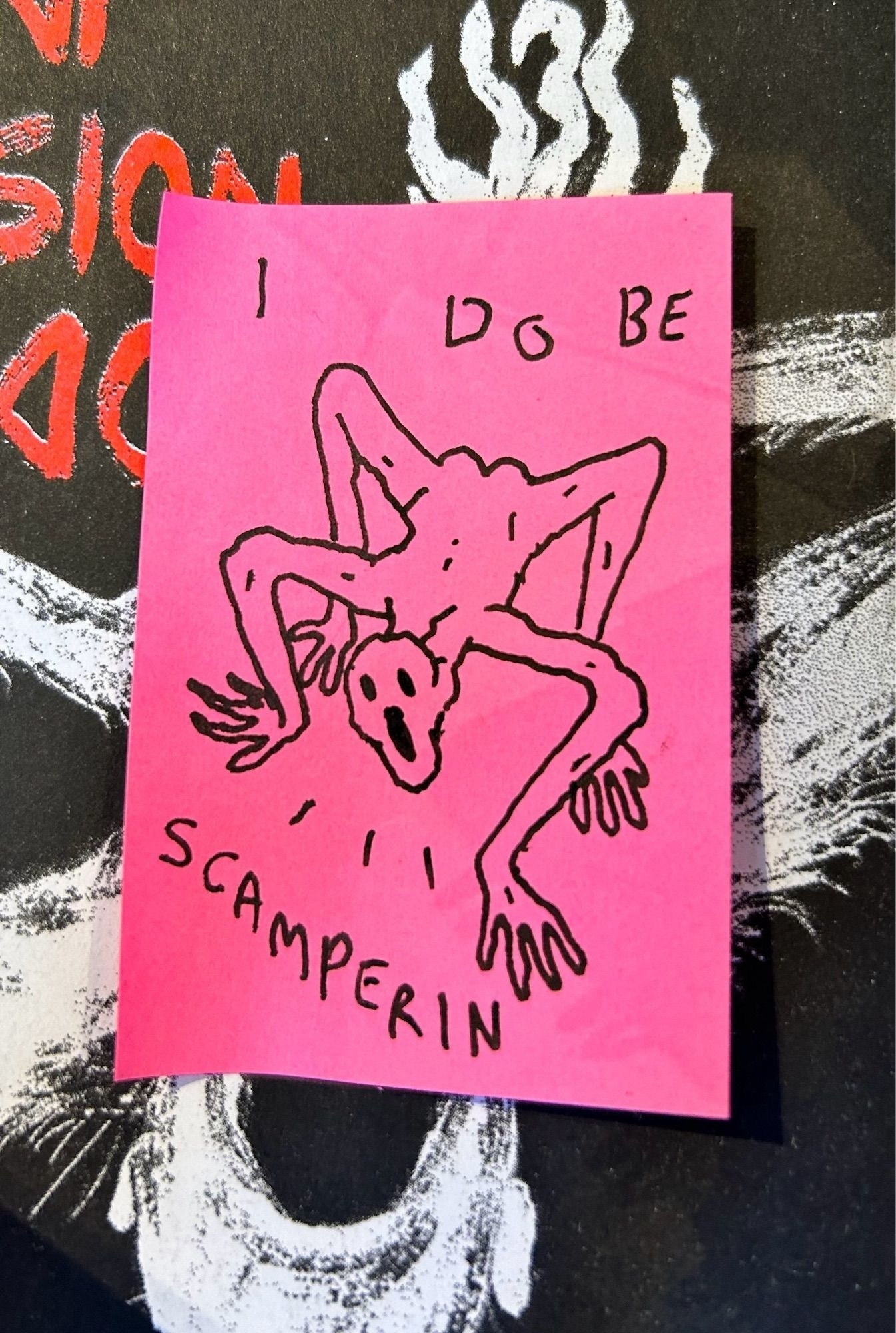 a line drawing of a scampering guy on a pink post it note, it says i do be scamperin