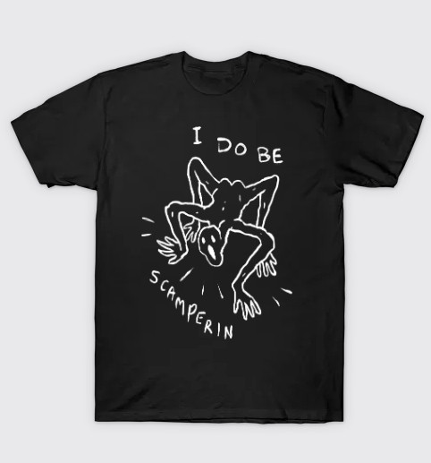 a white line drawing on a black shirt of a little weird ghoul guy scampering around naked on all fours. it says I Do Be Scamperin. we are all scampering under capitalism