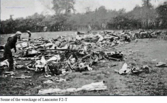 Crash site of Bazalgette’s Lancaster. The violence of the explosion is evident.
📷 aircrewremembered.com

(Blurry image of scattered wreckage in a field bordered by trees)