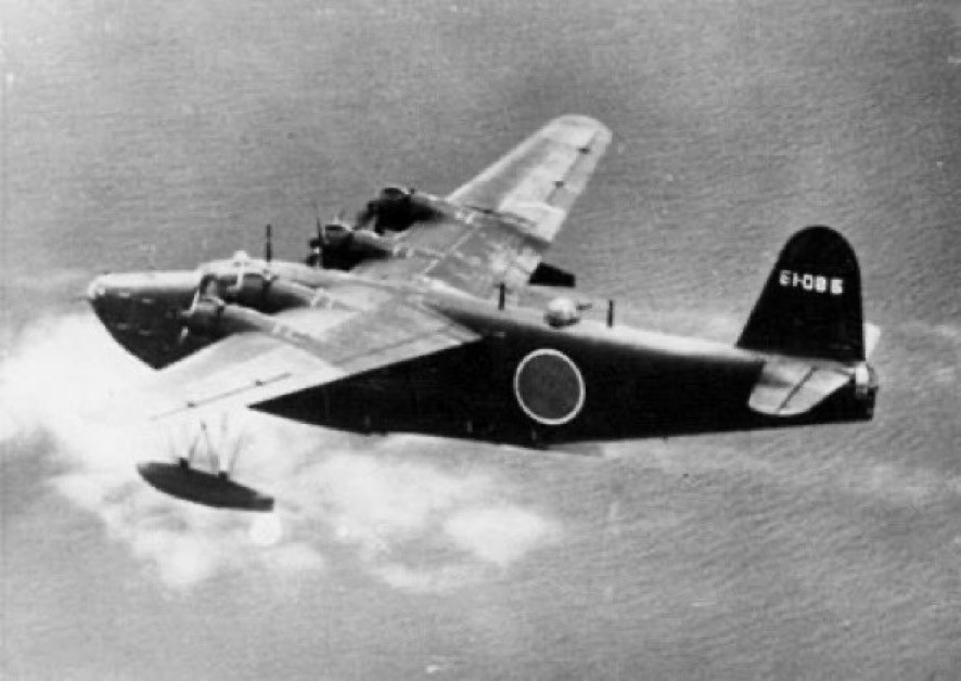 Large 4-engined flying boat pictured from another aircraft.