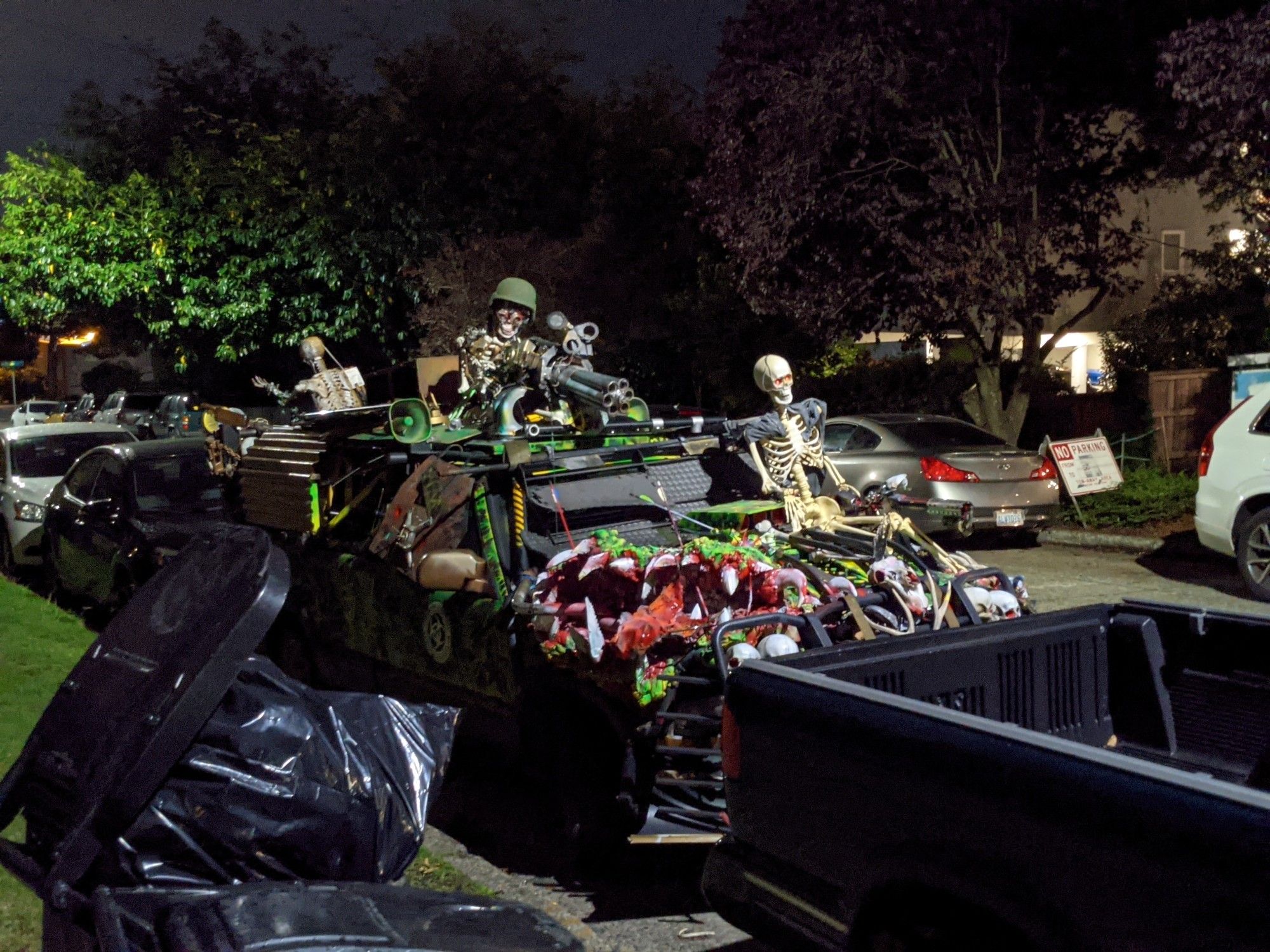 Front of Zombie Response Vehicle at night. Mouth and multiple skeletons