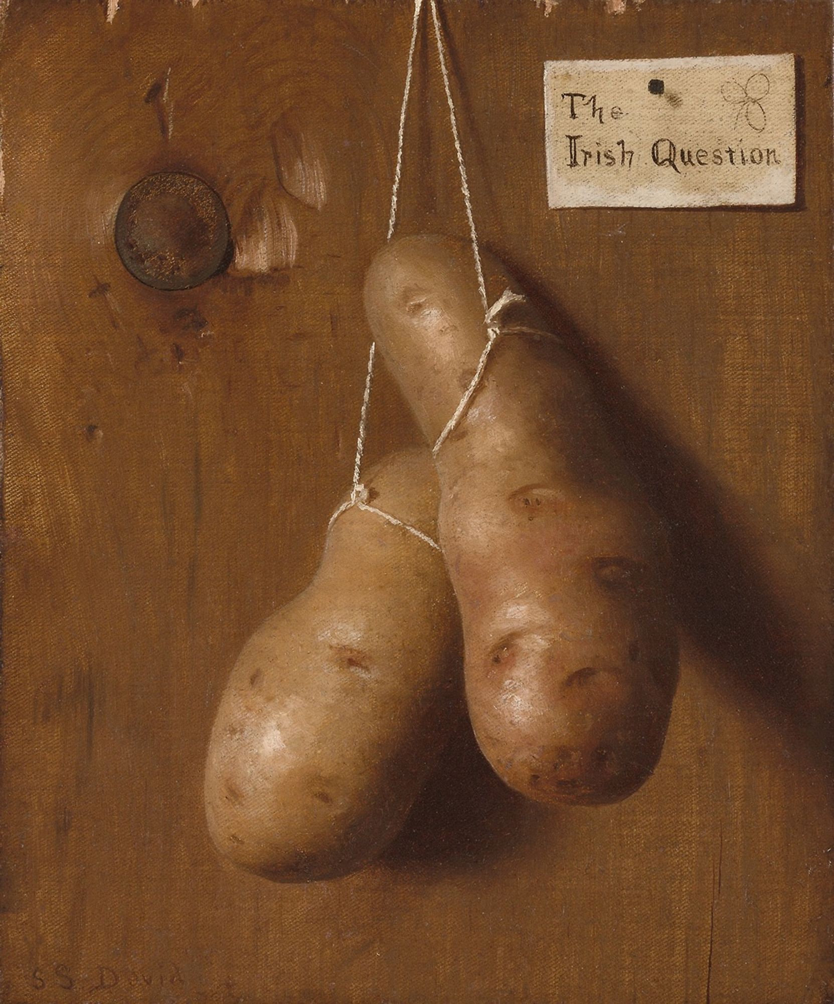 A seemingly uncomplicated representation of two potatoes suspended by a string against a wood panel, The Irish Question is an unusual and striking trompe l’oeil painting that raises numerous questions. The title may refer to the troubled status of the Irish in the late 19th century; the hanging potatoes inflect this allusion with either ominous overtones or a dark sense of humor. Illusionistic paintings such as The Irish Question offer an enjoyable form of visual deception, and the pseudonymous signature “S.S. David” suggests that De Scott Evans relished the opportunity to puzzle his viewers on many levels.

Restricted gift of Carol W. Wardlaw and Jill Burnside Zeno; Roger and J. Peter McCormick Endowments