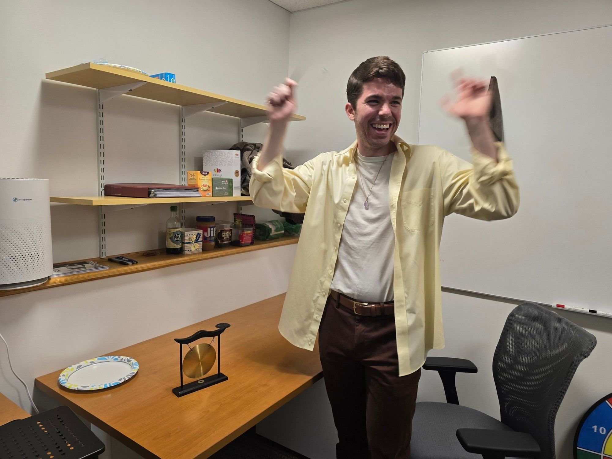 Colin celebrates after ringing the lab gong