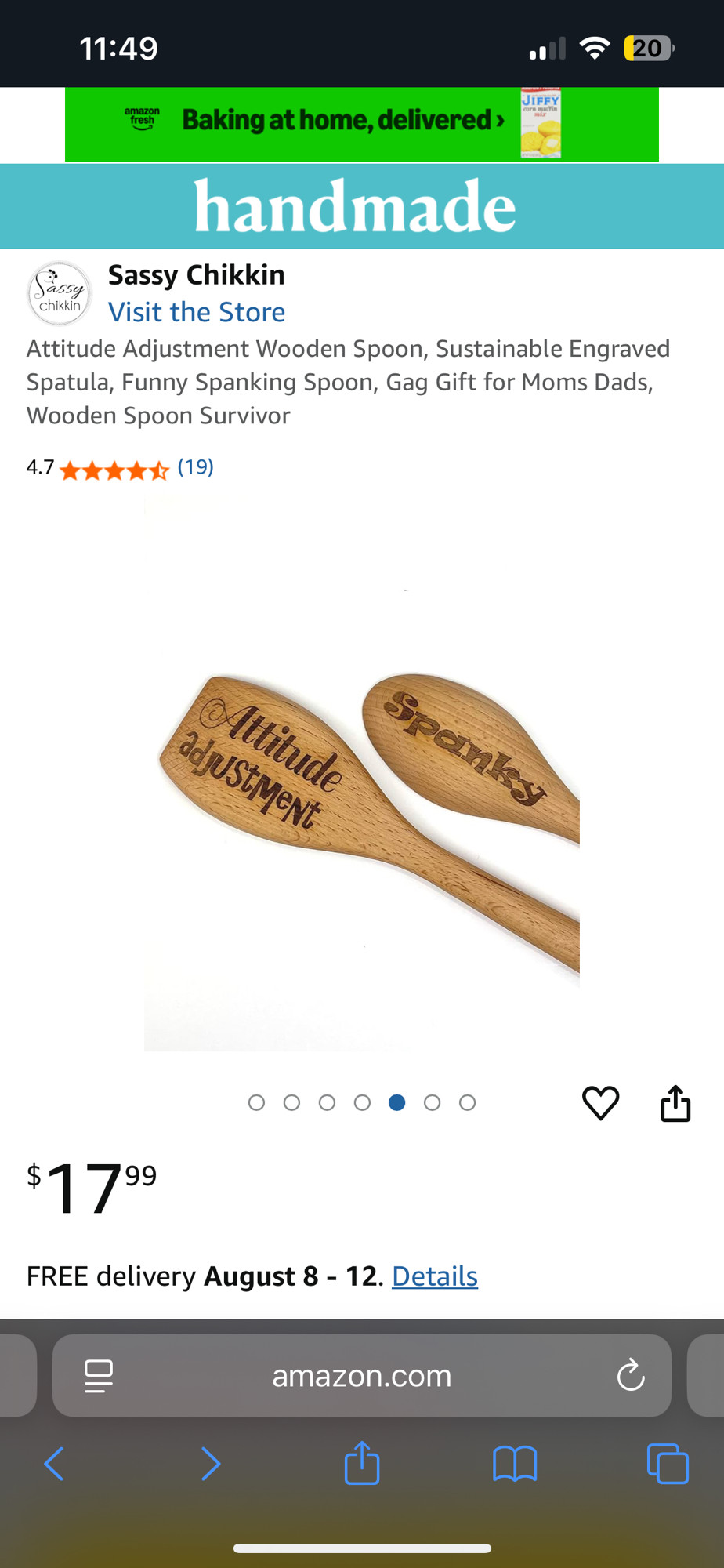 a wooden spoon for sale on amazon that says "attitude adjustment" on one side and "spanky" on the other