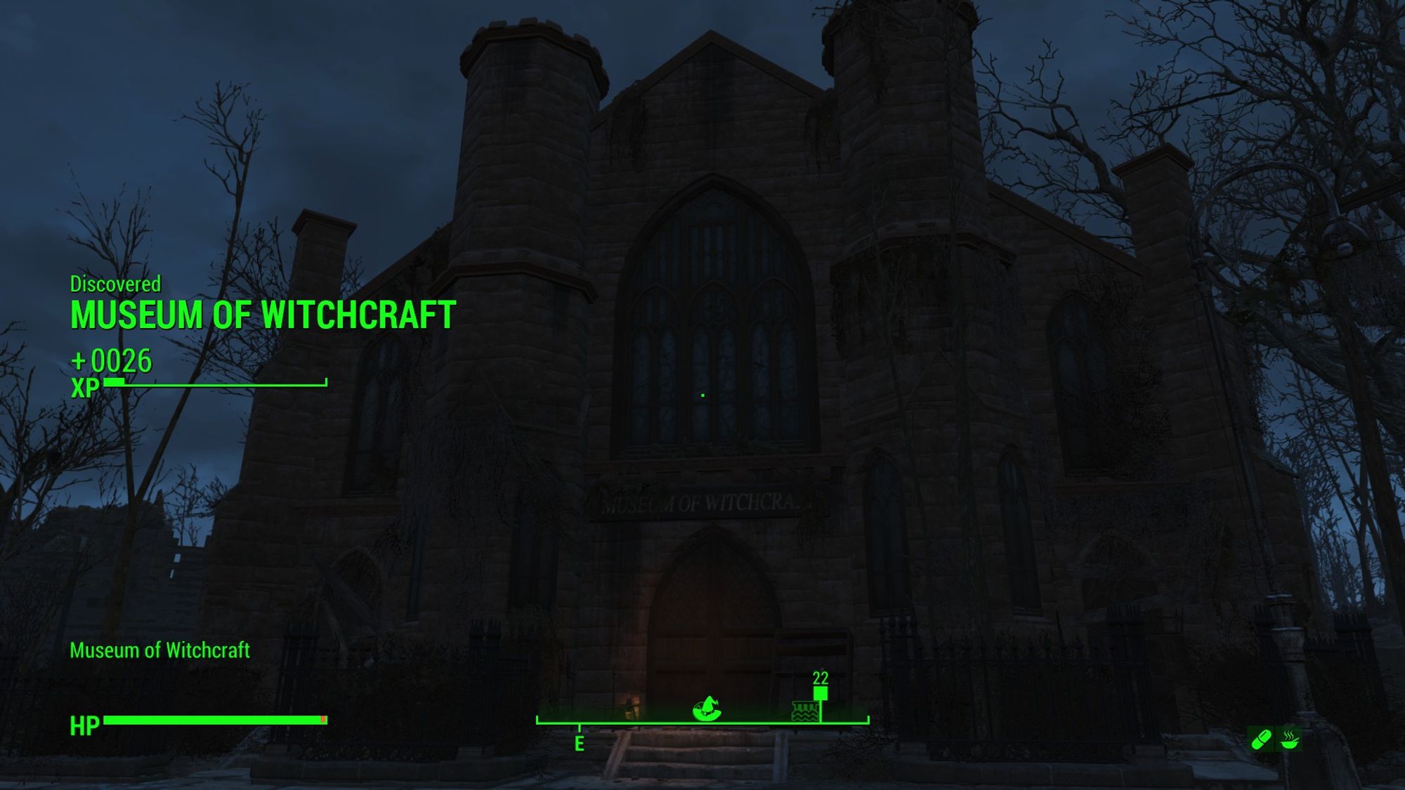 A screenshot from Fallout 4 of a tall old building with the words "discovered Museum of Witchcraft"