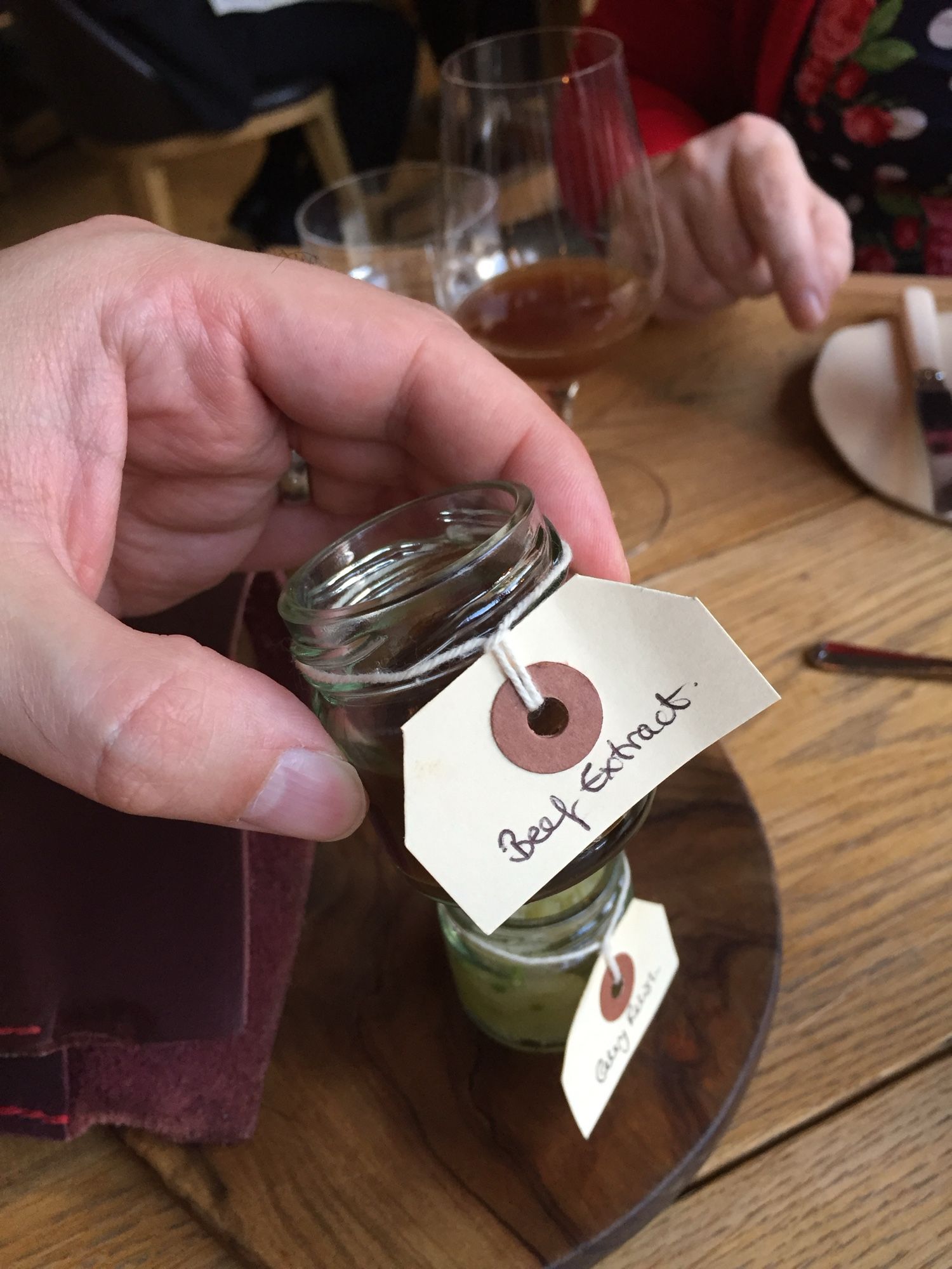 A cute, tiny jar with a hand-made label reading “BEEF EXTRACT”