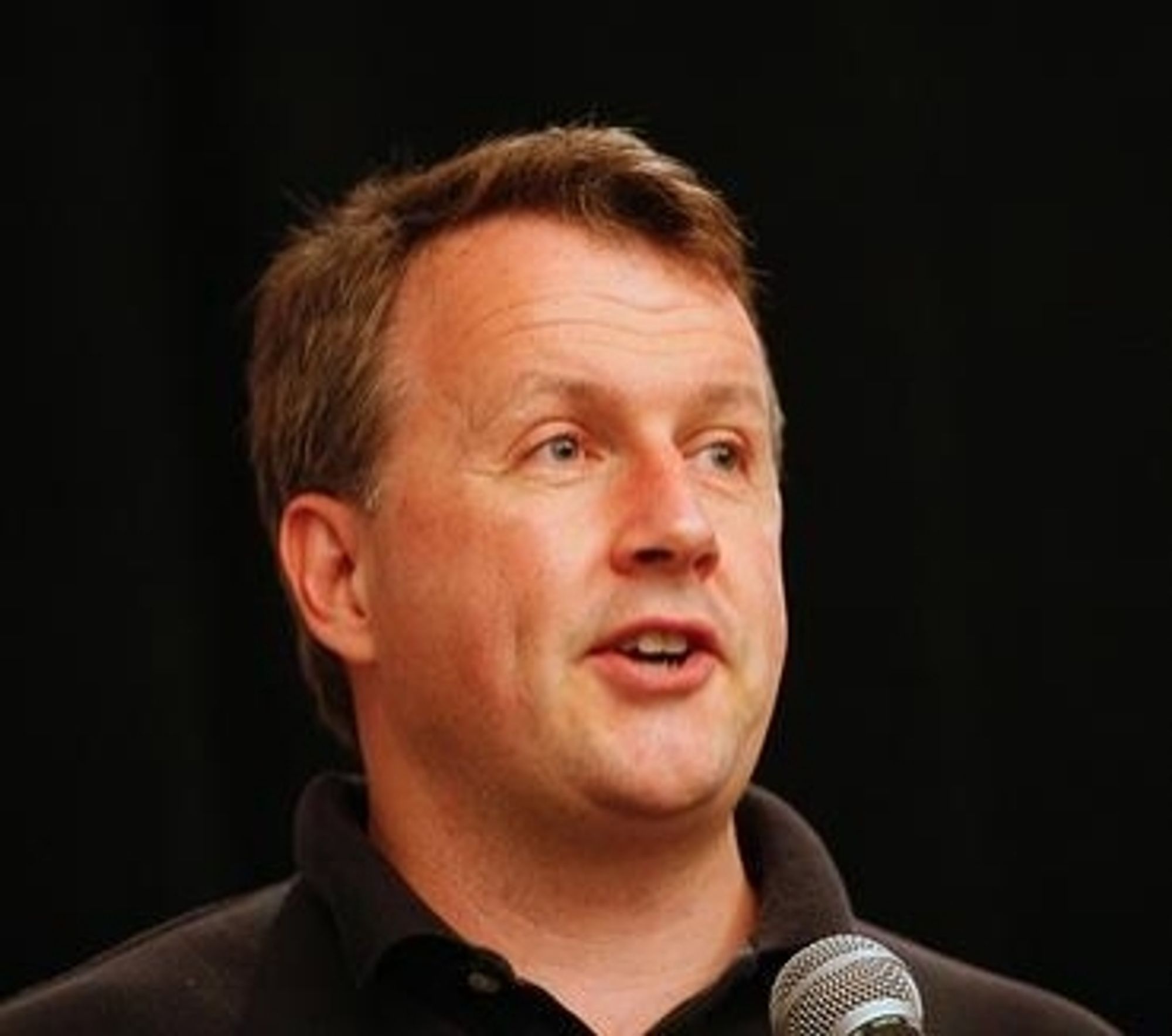 Paul Graham's profile pictre.  He is the most mediocre looking middle aged white man imaginable and he is wearing a black polo shirt that looks like hes had it for a decade, the official uniform of mediocre middle aged white men